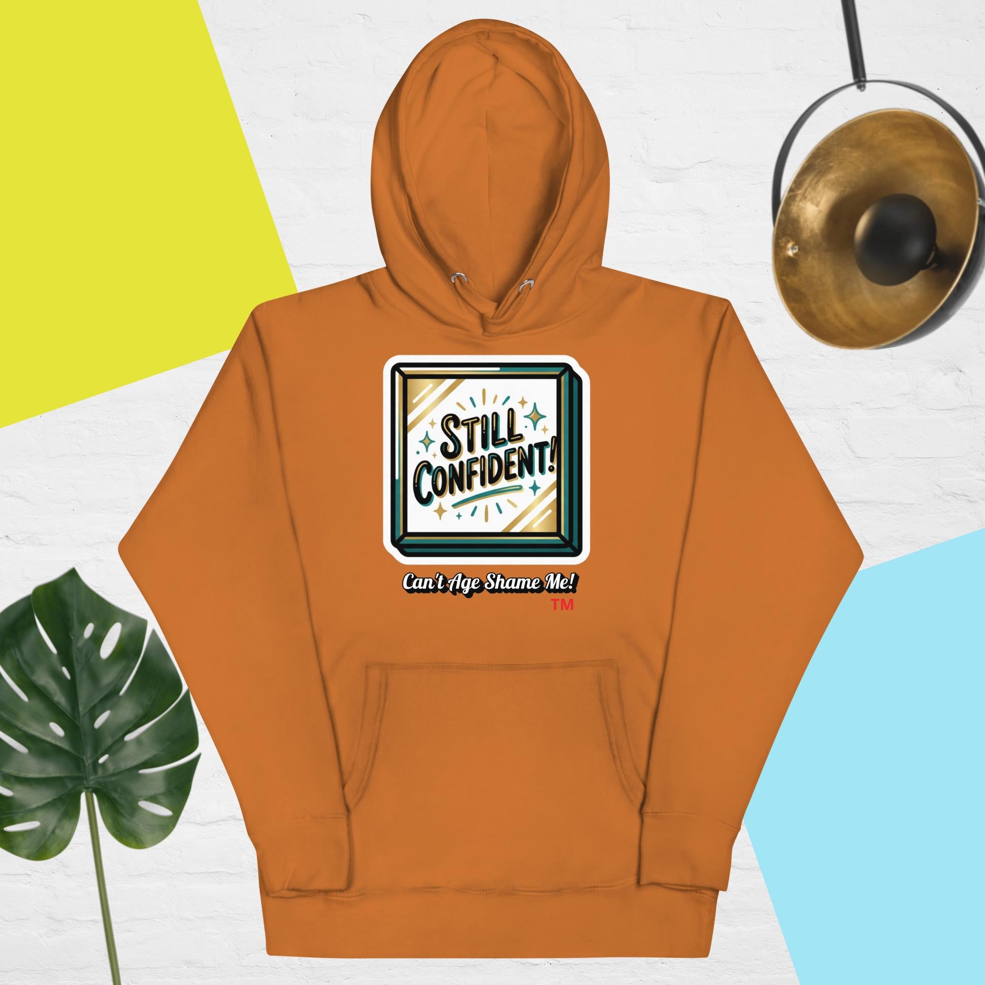 Adobe  hoodie with 'Still Confident' graphic on a colorful background