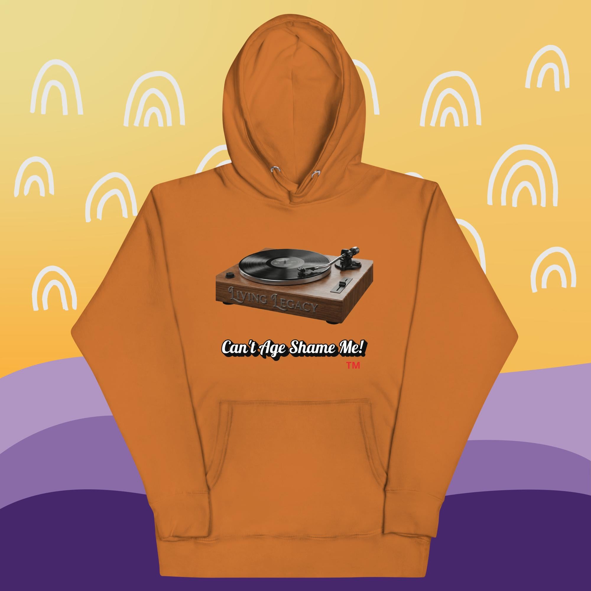 adobe hoodie with a graphic of a turntable and text can't age shame me! on a yellow and purple background