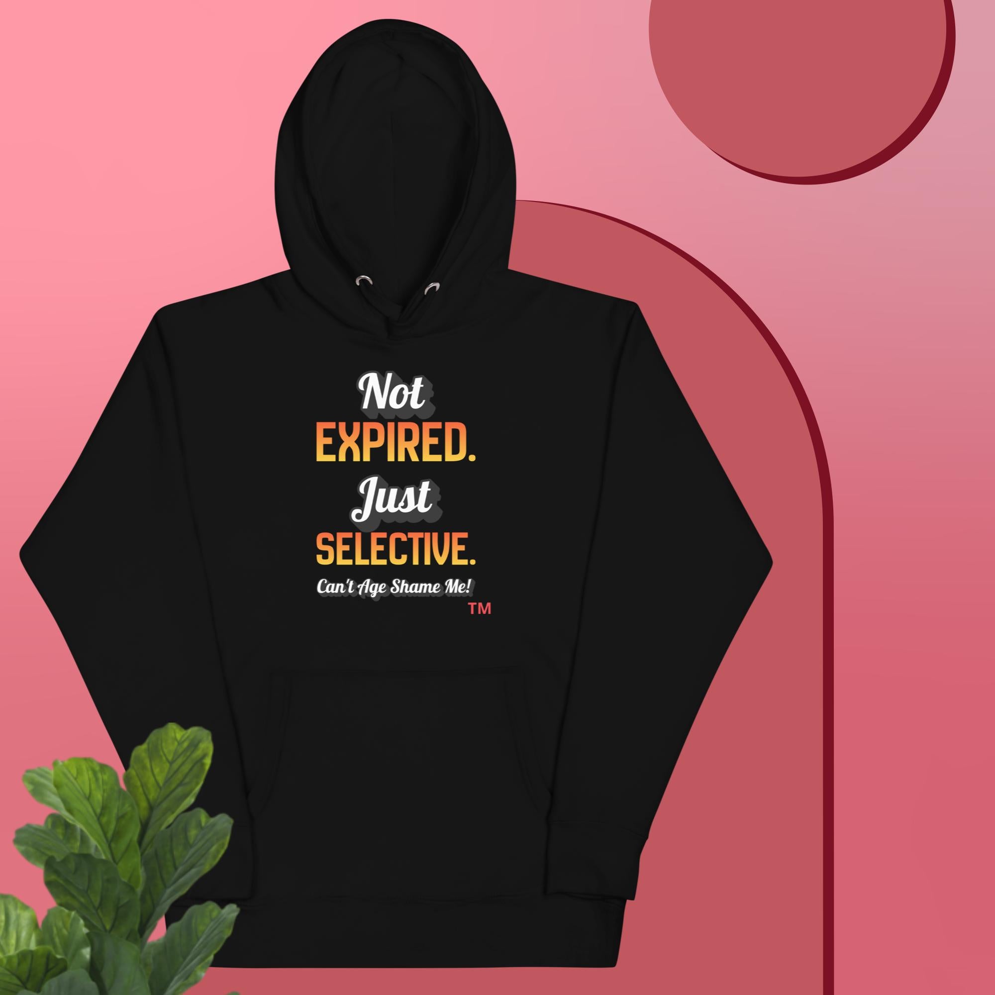 Black hoodie with text on a pink background