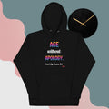 Black hoodie with colorful text design and a clock on a multicolored background