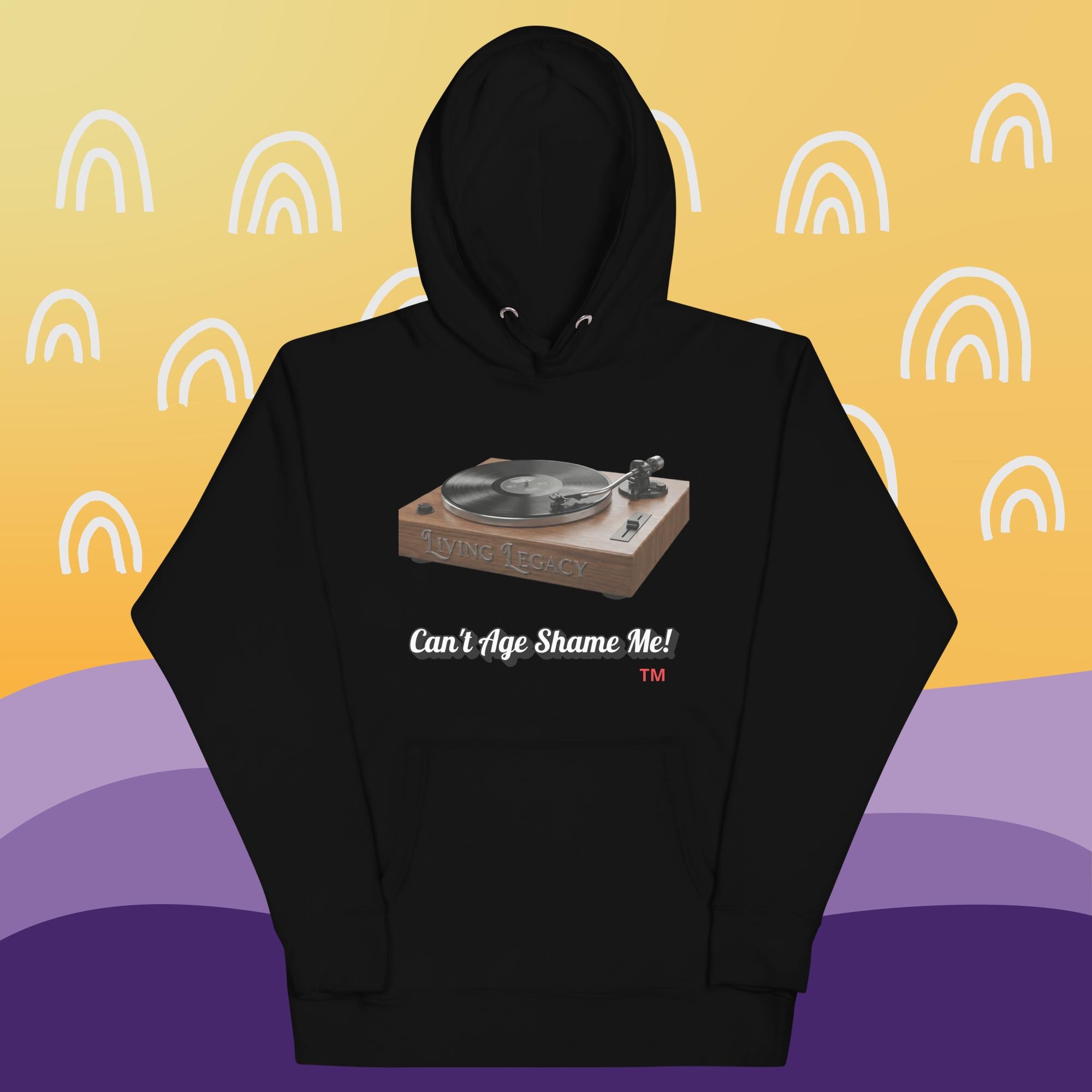 black hoodie with a graphic of a turntable and text can't age shame me! on a yellow and purple background