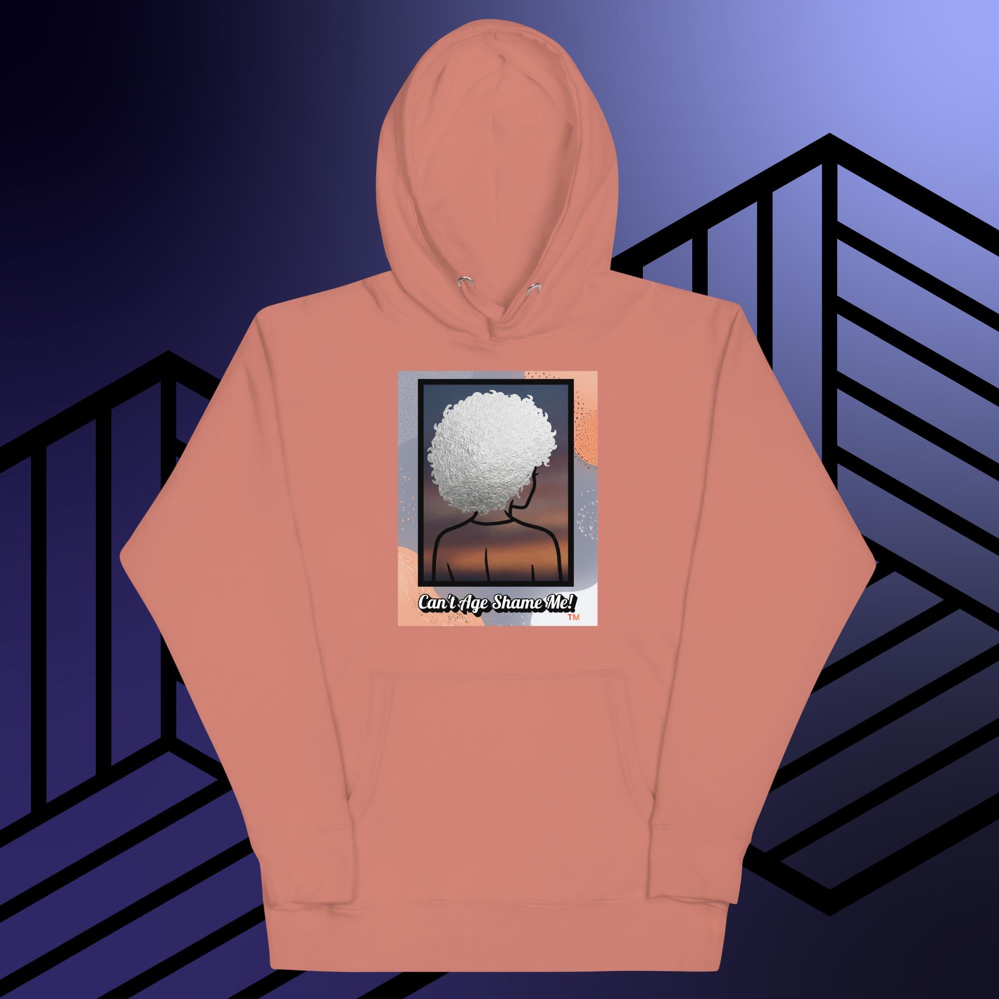 Dusty Rose hoodie with a graphic design of a person with textured hair and text 'Can't Age Shame Me!' on a colorful background.