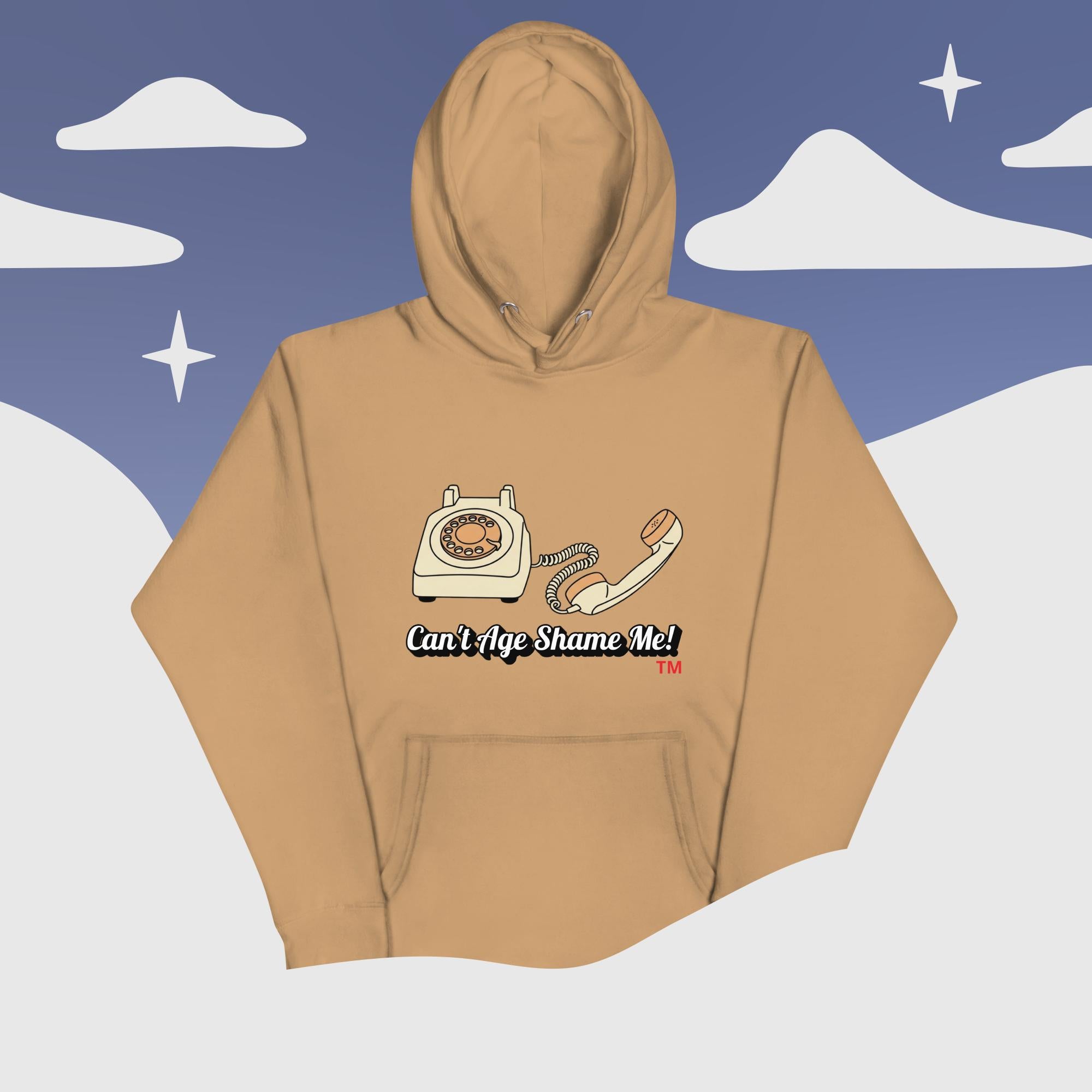 khaki  hoodie with phone graphic and text 'Can't Age Shame Me!' on a snowy landscape background