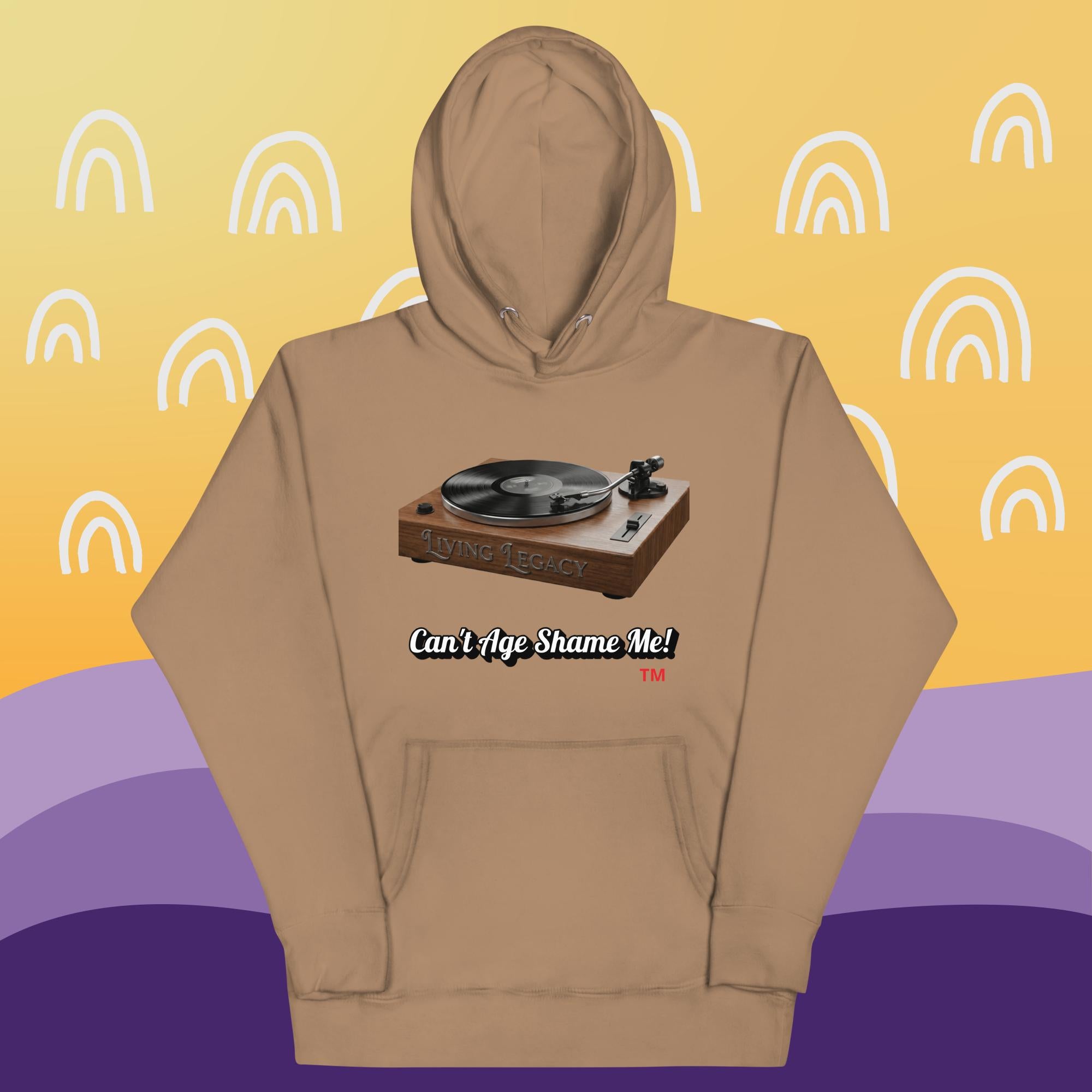 latte hoodie with a graphic of a turntable and text can't age shame me! on a yellow and purple background