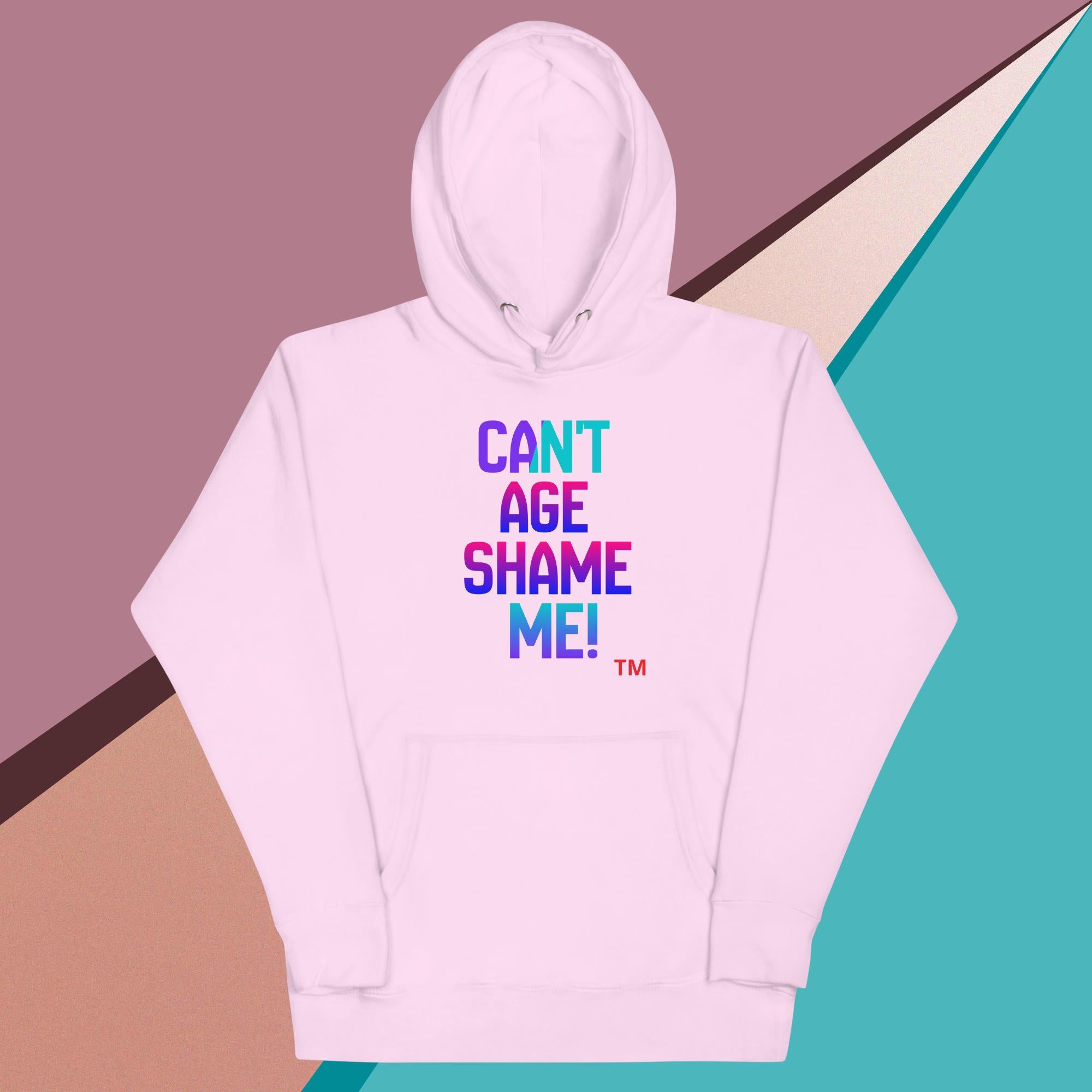 Light pink hoodie with colorful text on a multicolored background