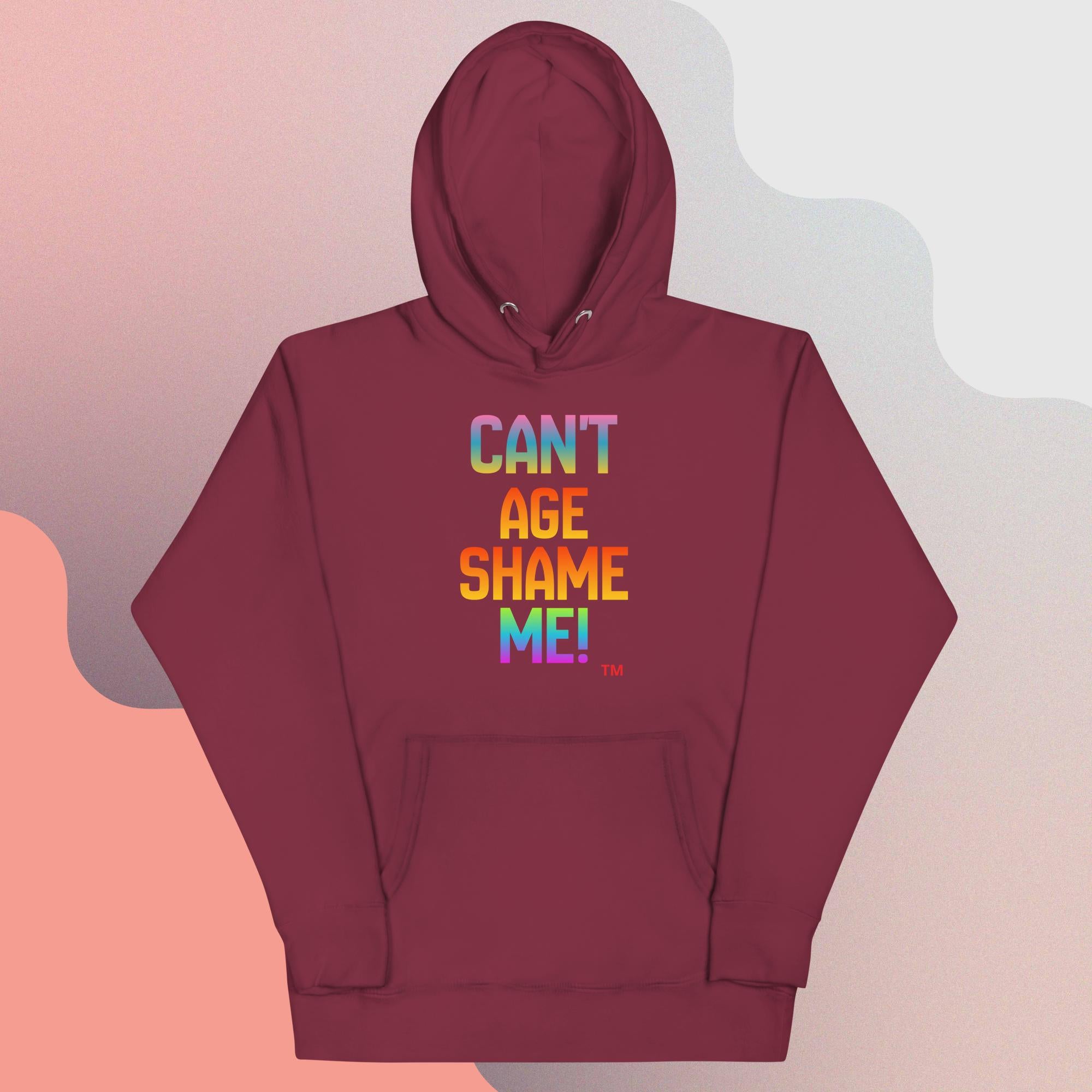 Maroon hoodie with colorful text on a gradient background
