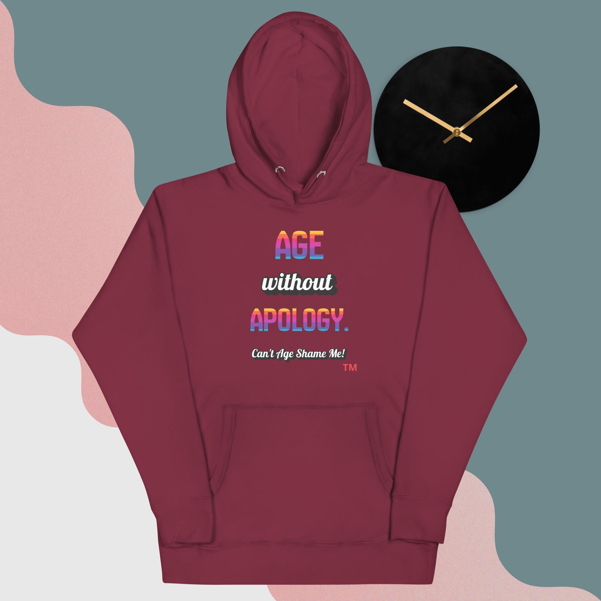 Maroon hoodie with colorful text design on a gradient background