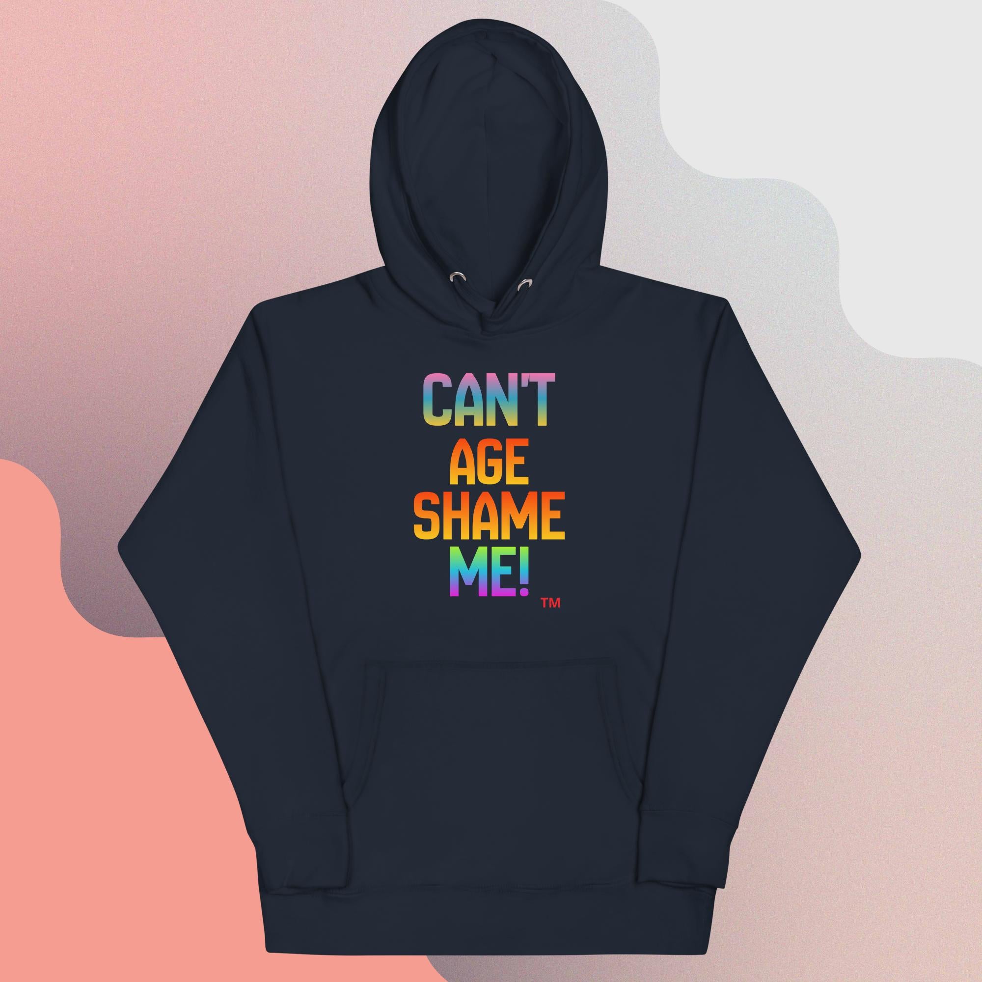 Black hoodie with colorful text 'CAN'T AGE SHAME ME!' on a gradient background