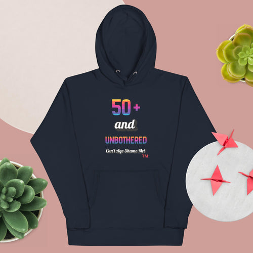 Navy blue hoodie with colorful text on a pink background with decorative elements.