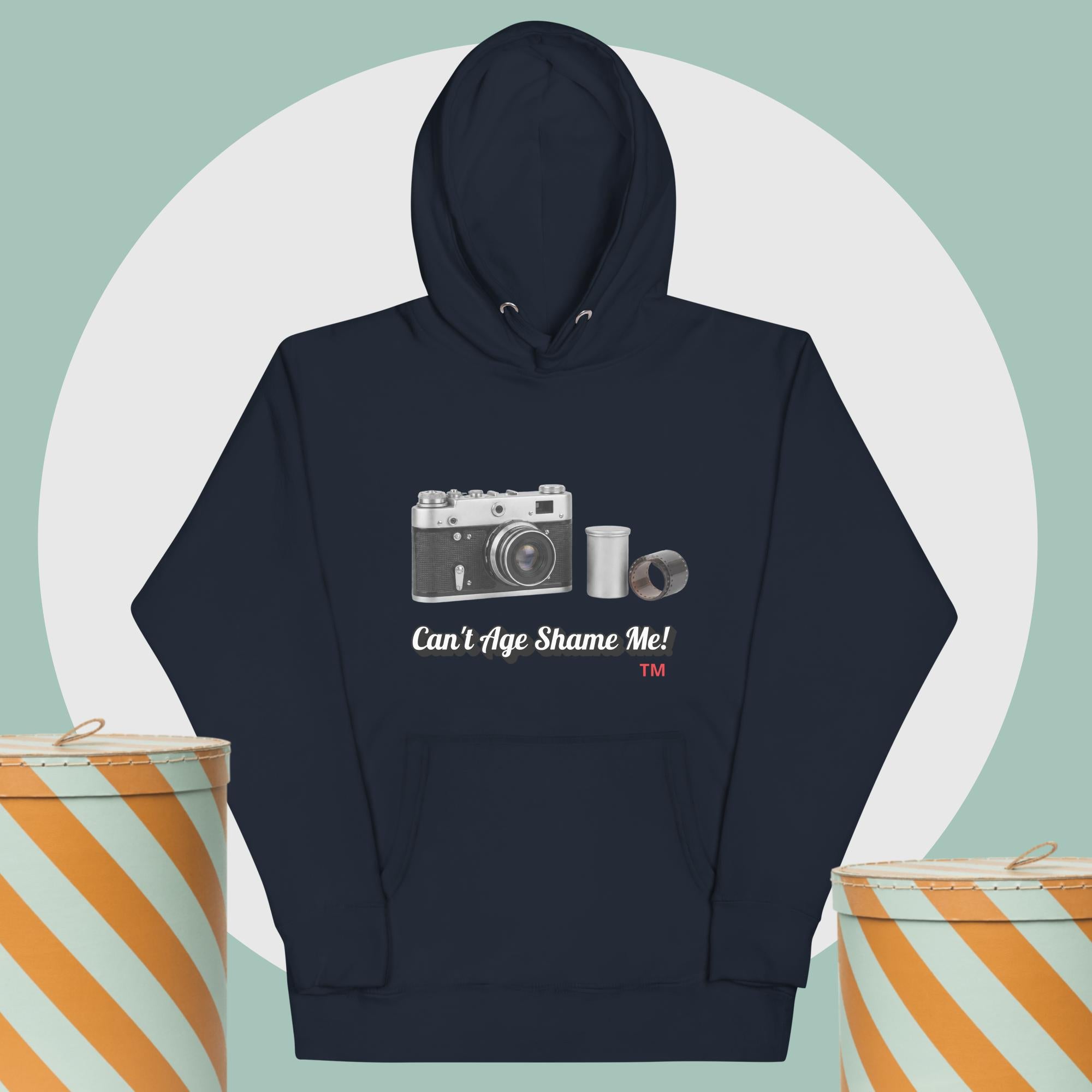 navy hoodie with camera graphic background two yellow and white hat boxes