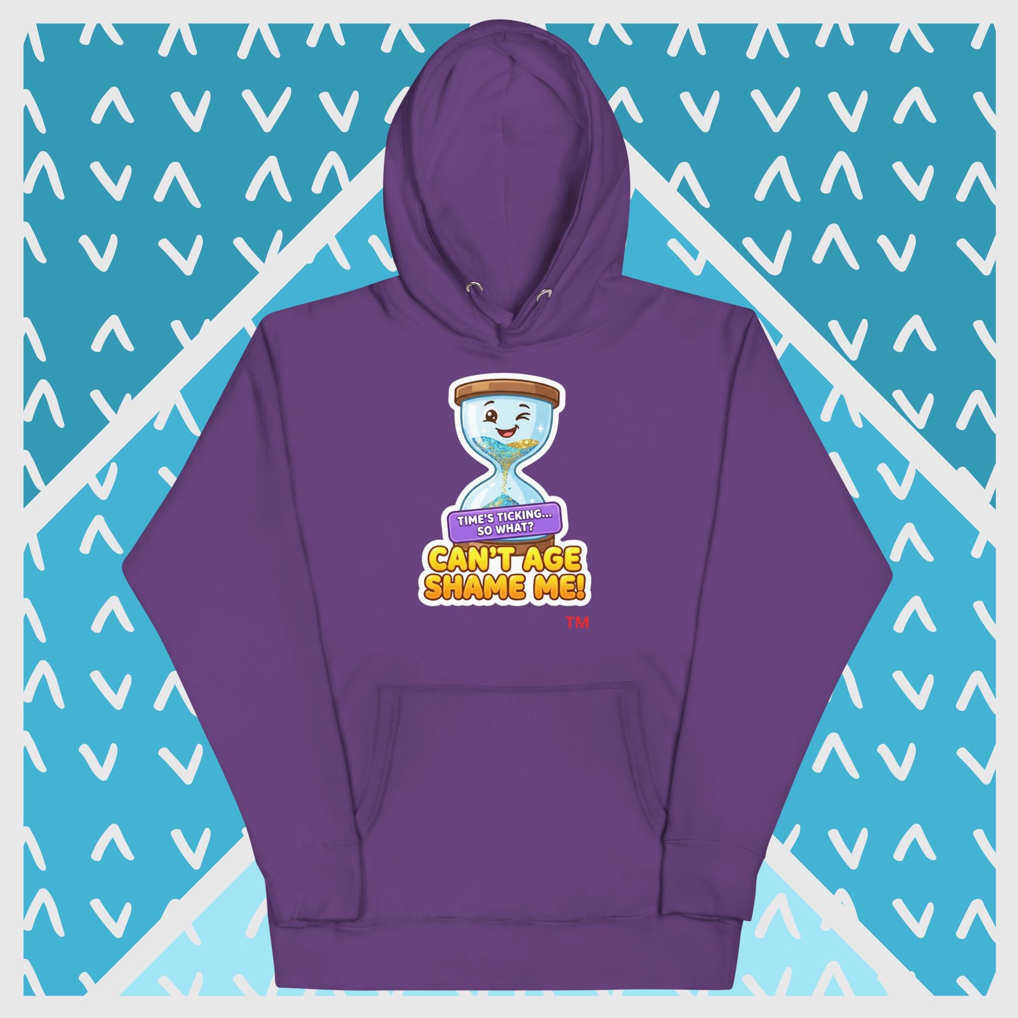 Purple hoodie with a hour glass design on a blue background with white geometric patterns