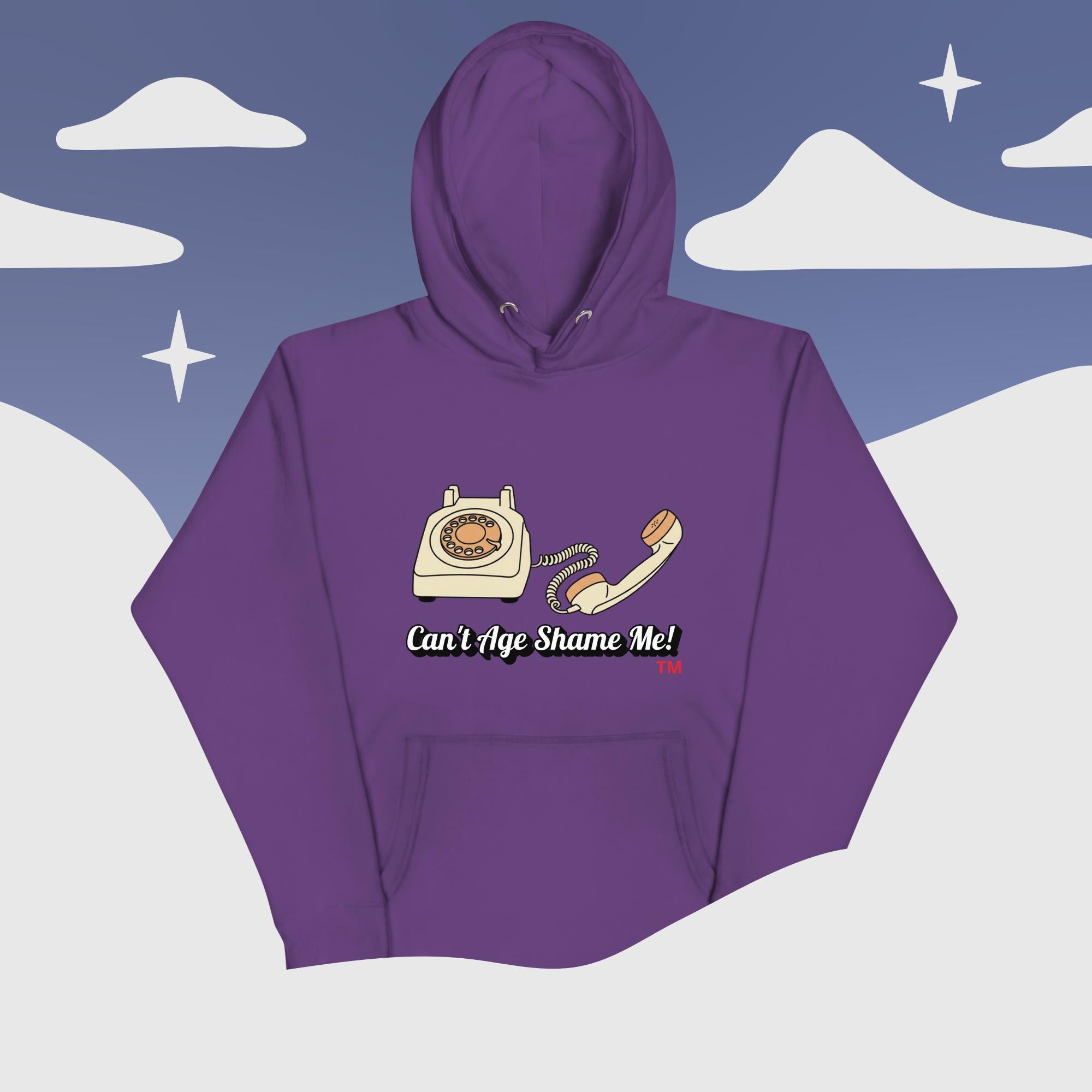 Purple hoodie with phone graphic and text 'Can't Age Shame Me!' against a snowy mountain background
