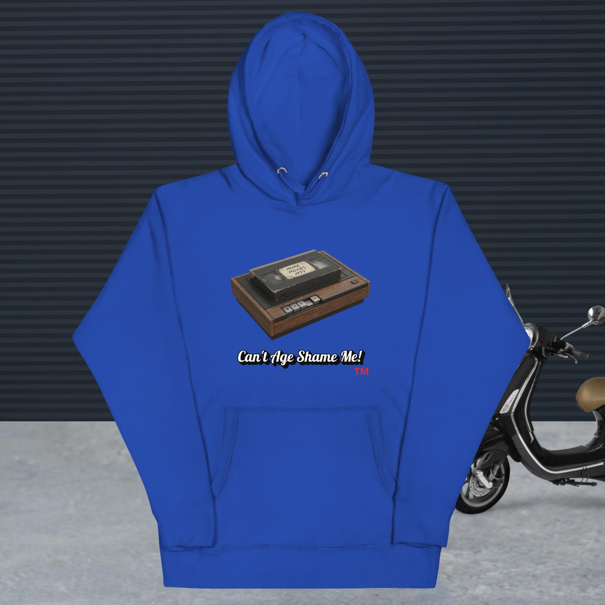 team royal hoodie with a design of vhs recorder and tape