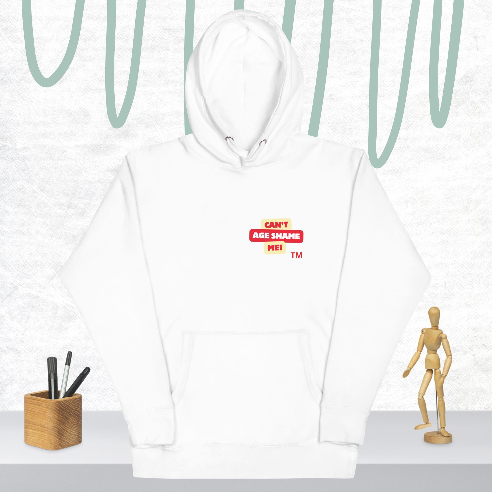 White hoodie with a red and white logo text 'CAN'T AGE SHAME ME! on a light gray background
