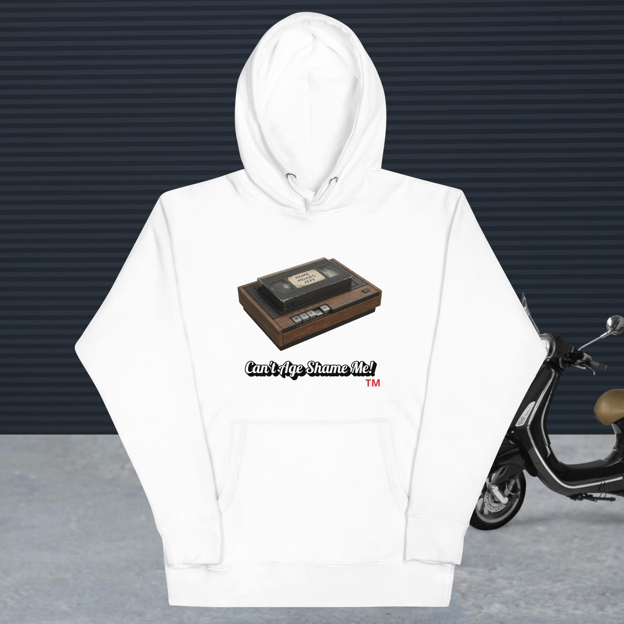 white hoodie with a design of vhs recorder and tape