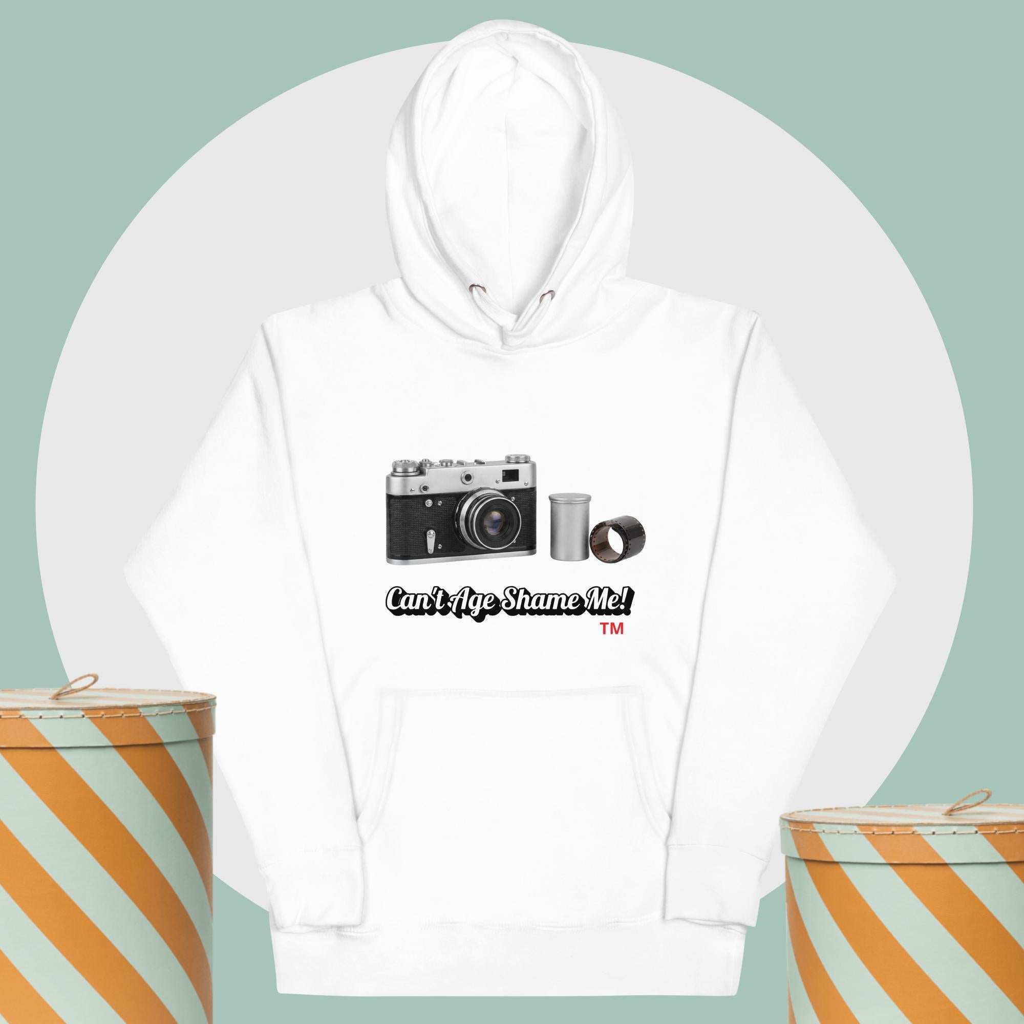 White  hoodie with camera graphic background two yellow and white hat boxes
