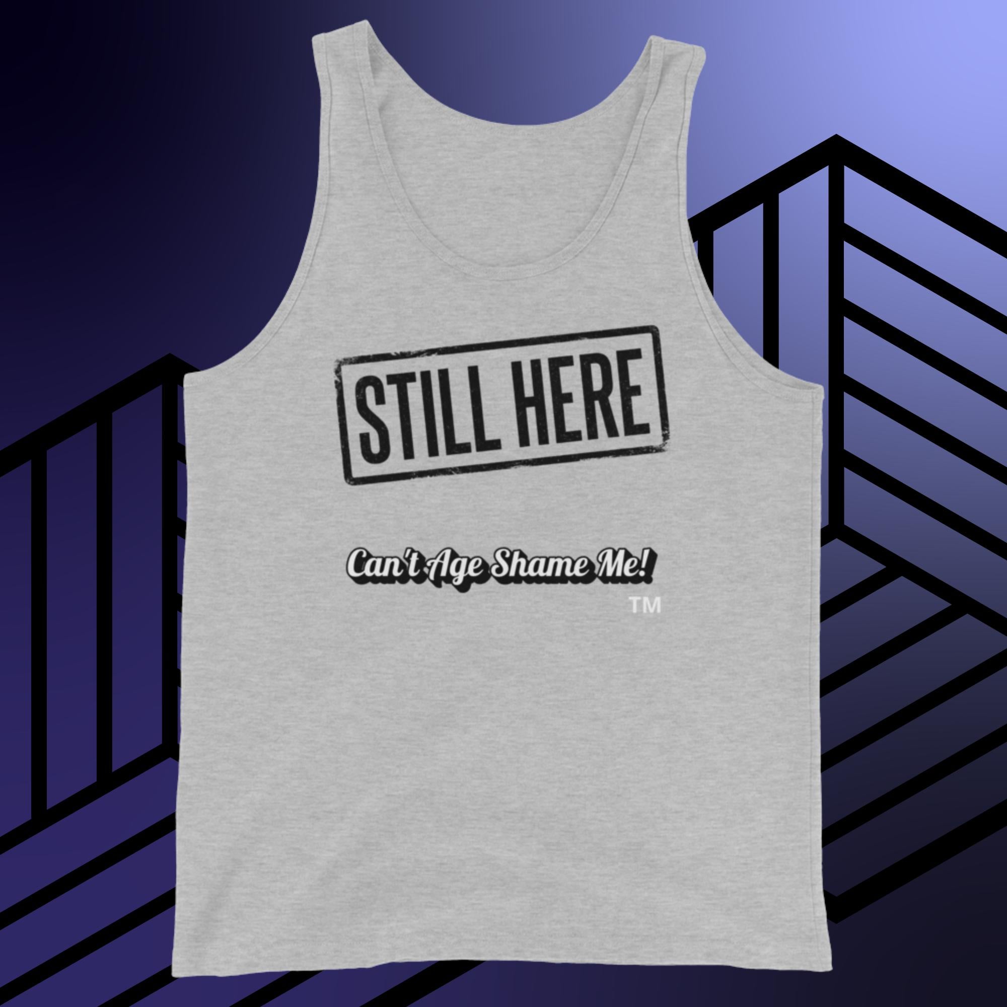Light Gray tank top with 'STILL HERE Can't Age Shame Me!' text on a blue and black striped background