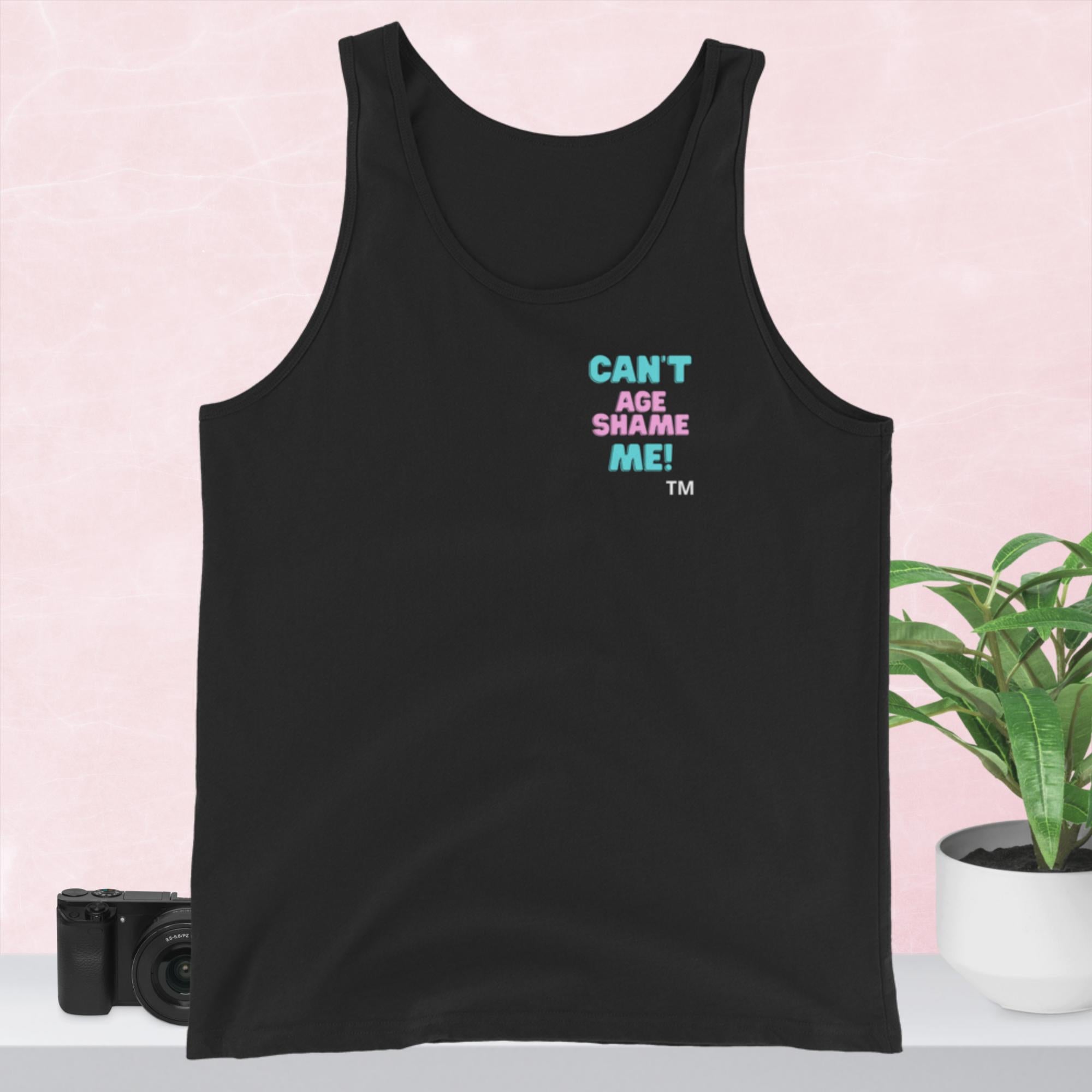 Black tank top with text Can't age Shame Me!  on a pink background