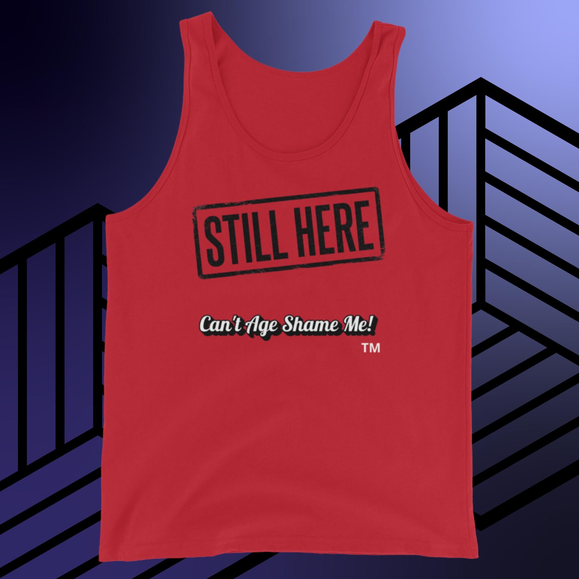 Red tank top with 'STILL HERE Can't Age Shame Me!' text on a blue and black striped background
