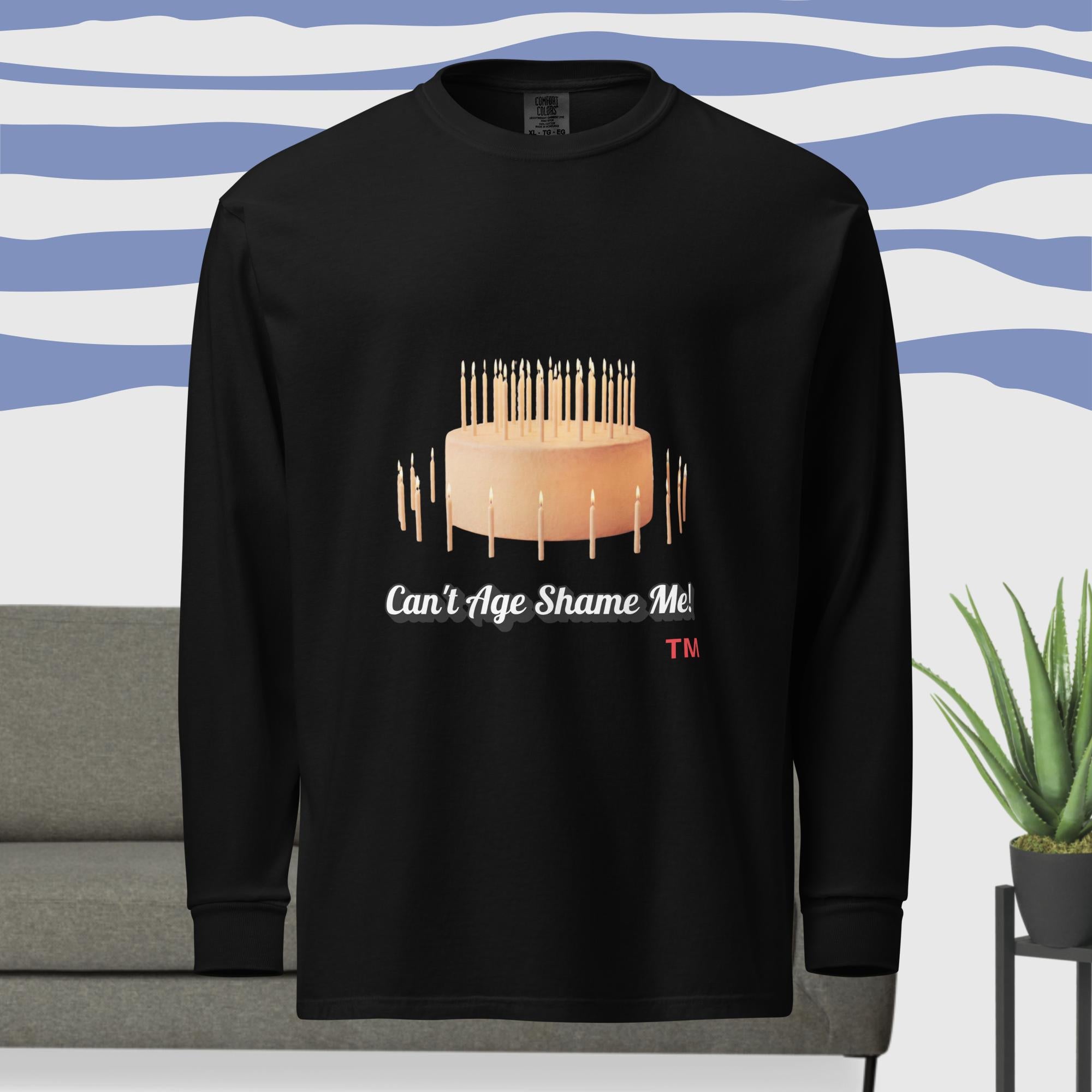 Black long-sleeve shirt with a cake and candles design 