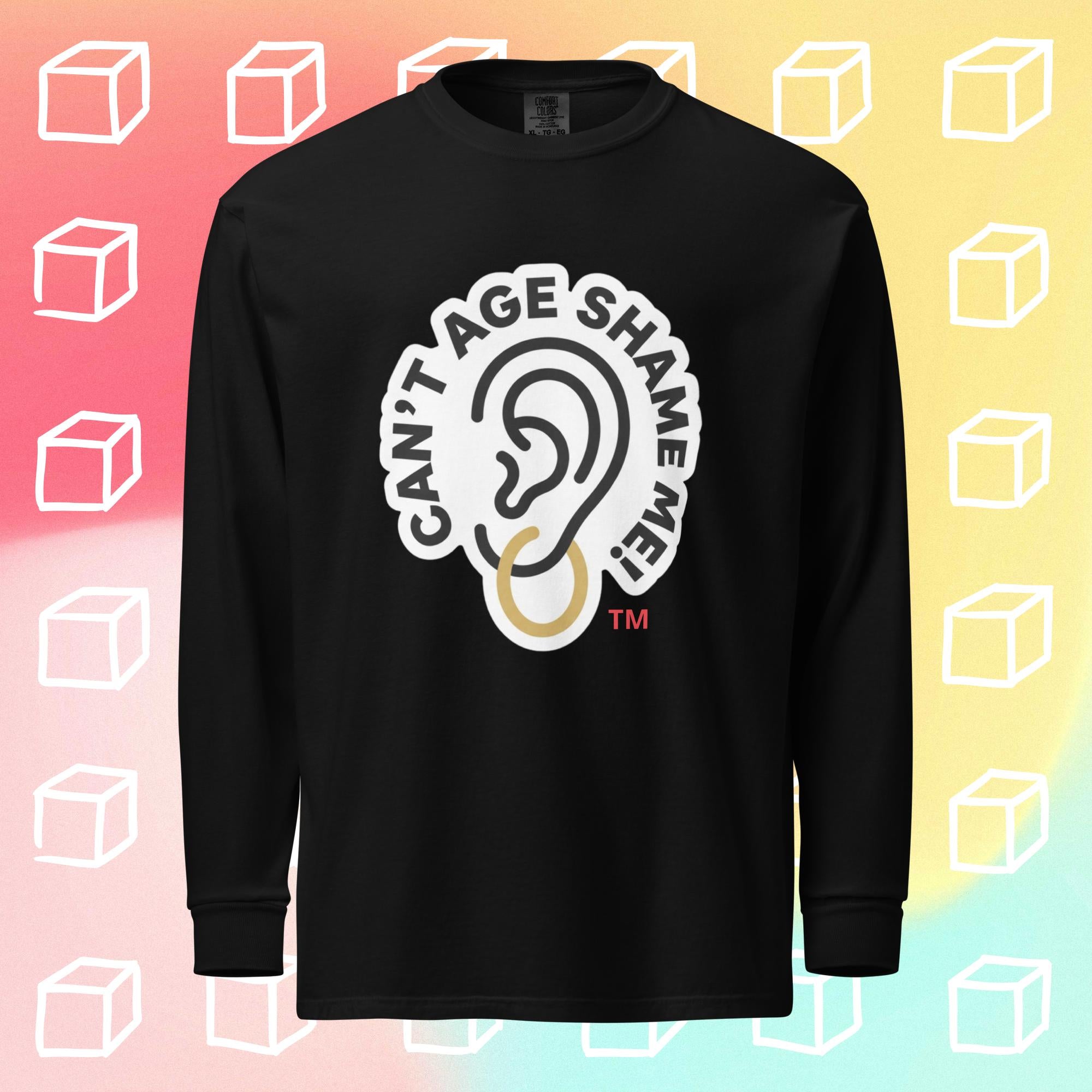 Black long-sleeve shirt with 'Can't Age Shame Me' graphic on a colorful background with white cube outlines.