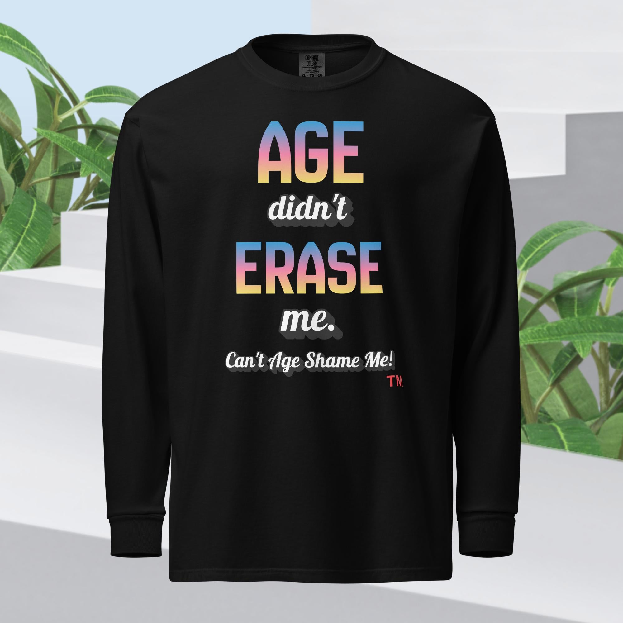 Black long-sleeve shirt with colorful text on a light background