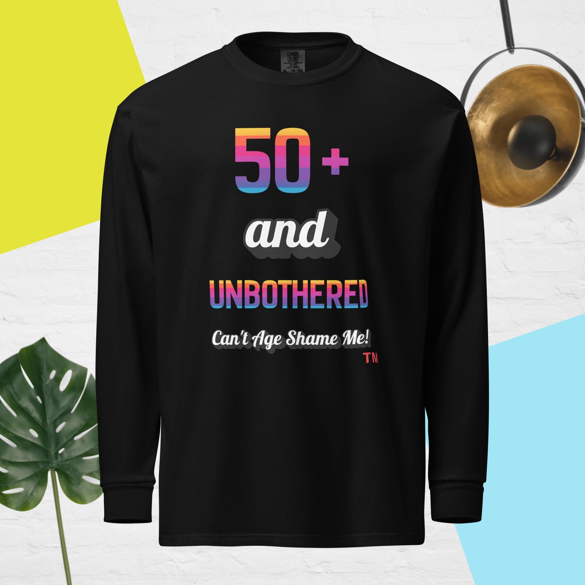 Black long-sleeve shirt with colorful text on a multicolored background