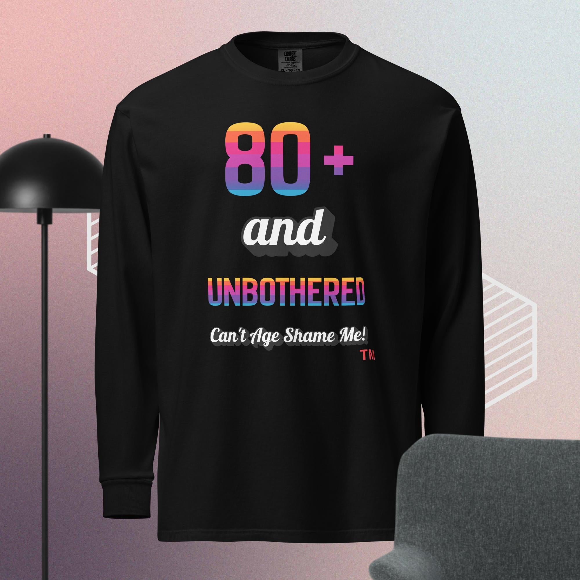 Black long-sleeve shirt with colorful text design on a gradient background
