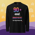 Black long-sleeve shirt with colorful text on a yellow and purple background