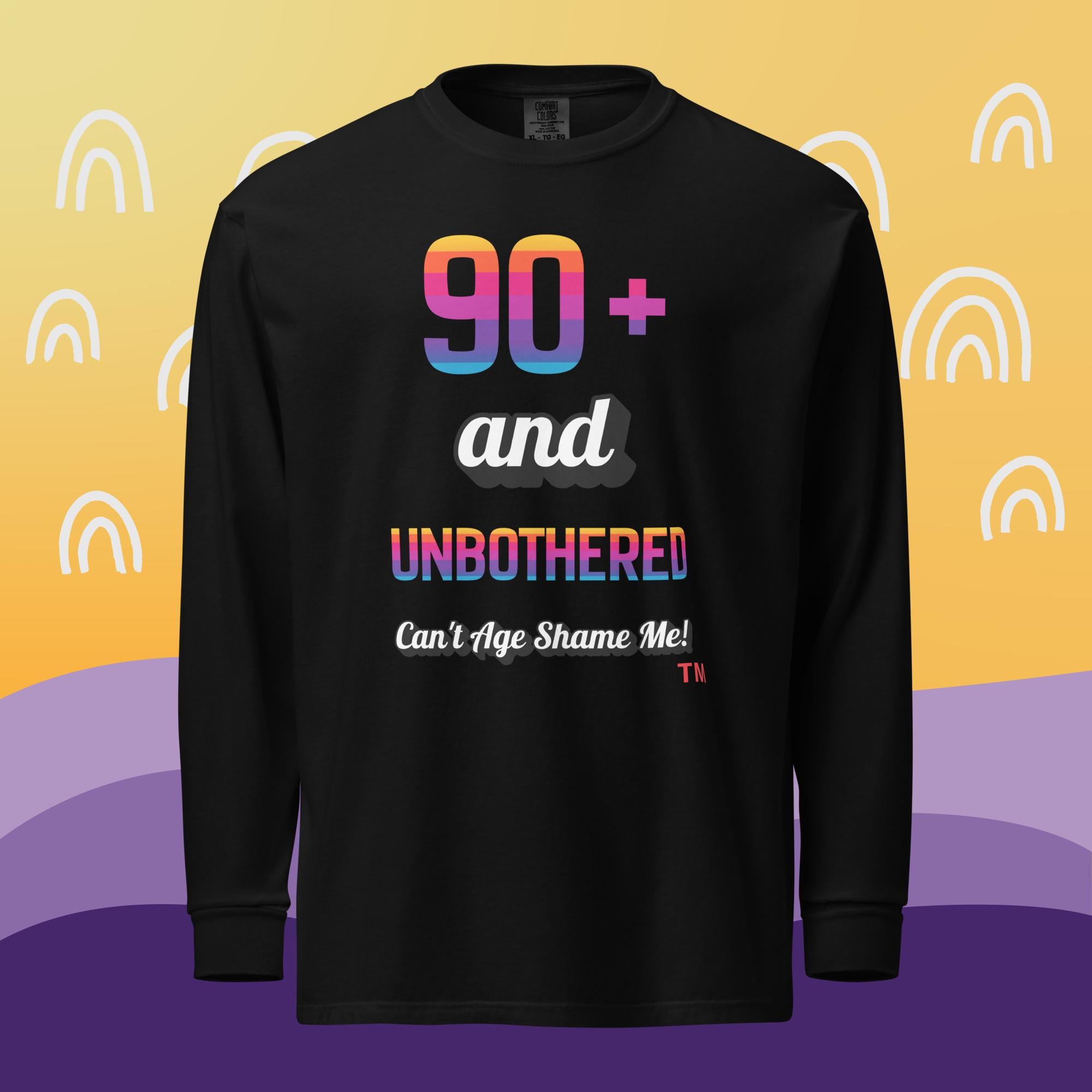 Black long-sleeve shirt with colorful text on a yellow and purple background