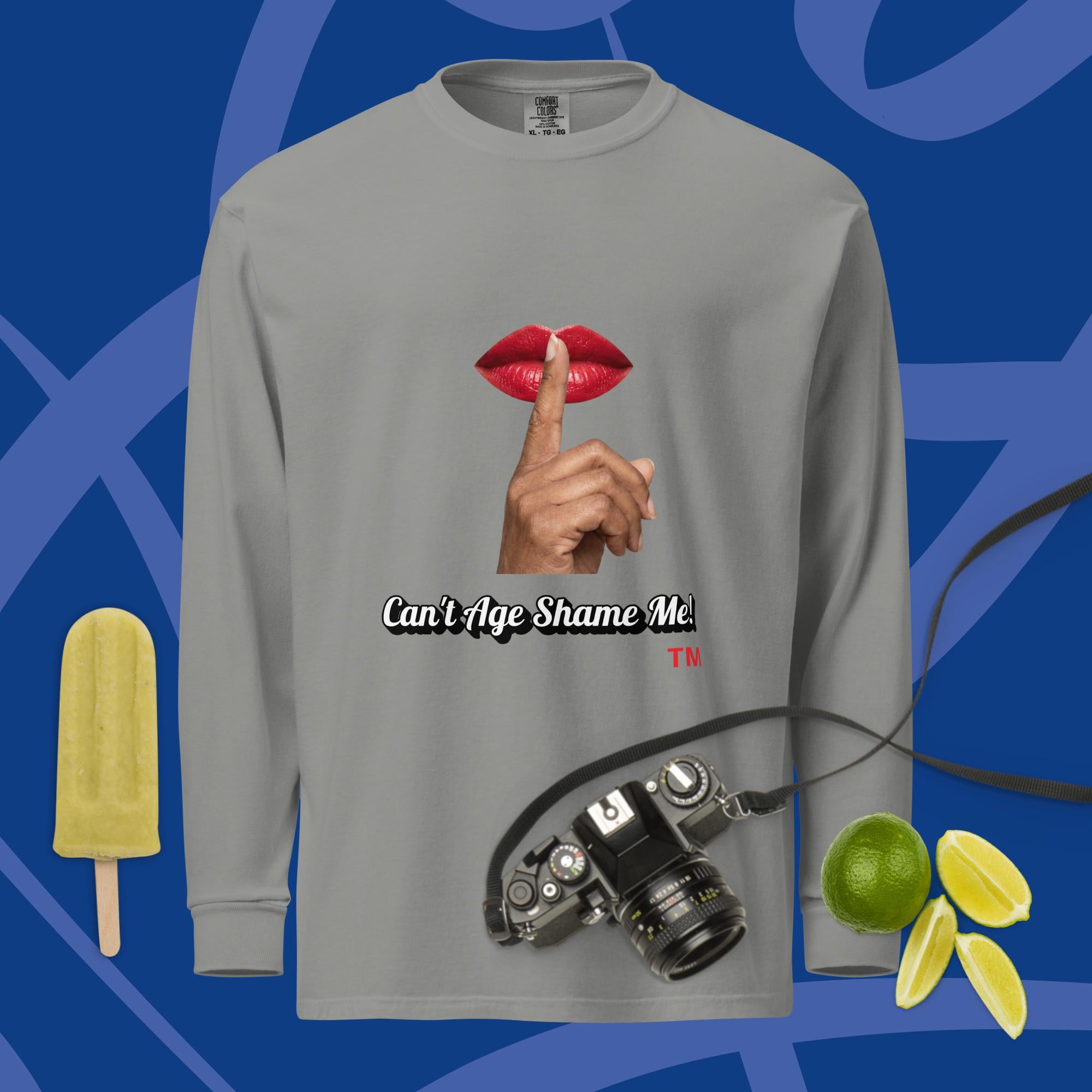 Gray long-sleeve shirt with a graphic design of lips and a finger on a blue background