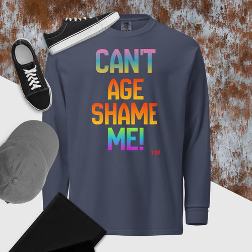 Navy long-sleeve shirt with colorful text 'CAN'T AGE SHAME ME!' on a textured surface.