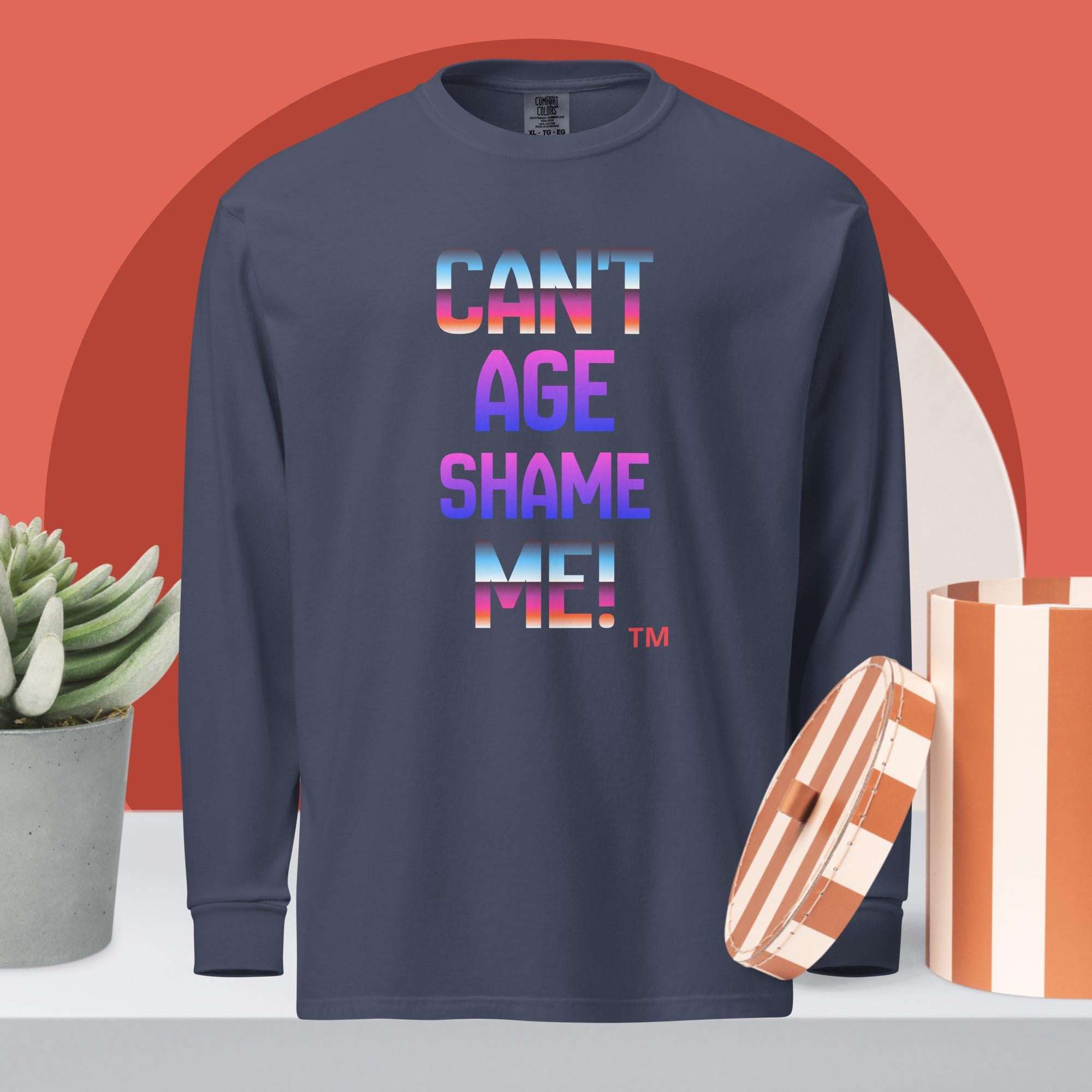 Navy blue long-sleeve shirt with colorful text on a red background