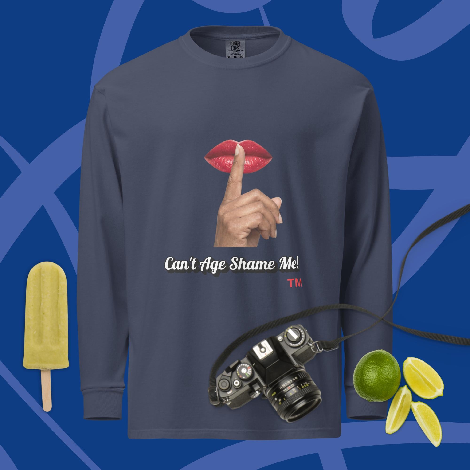Navy long-sleeve shirt with a graphic design of lips and a finger on a blue background