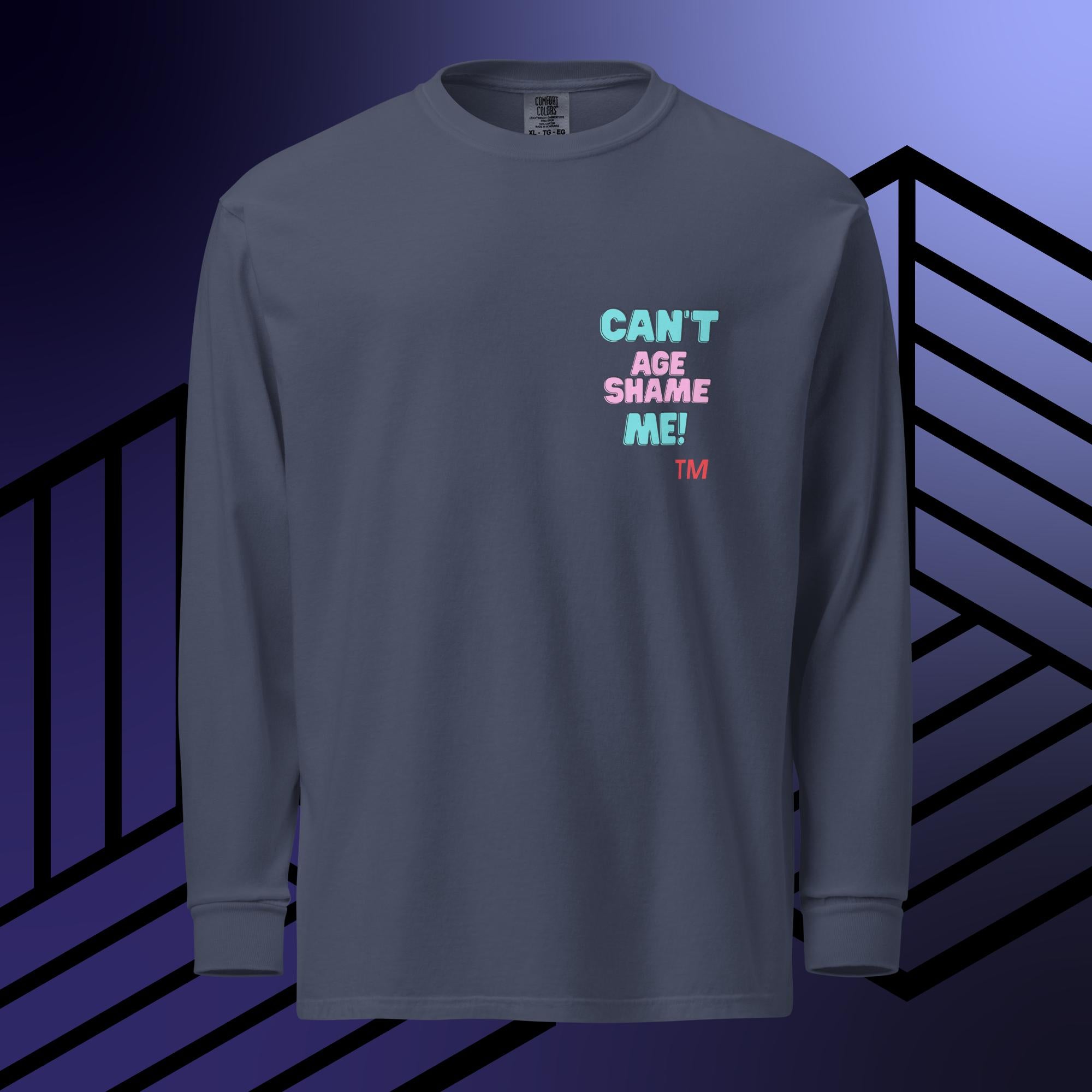 Blue long sleeve shirt with colorful text: 'Can't Age Shame Me'  on a blue and black striped background