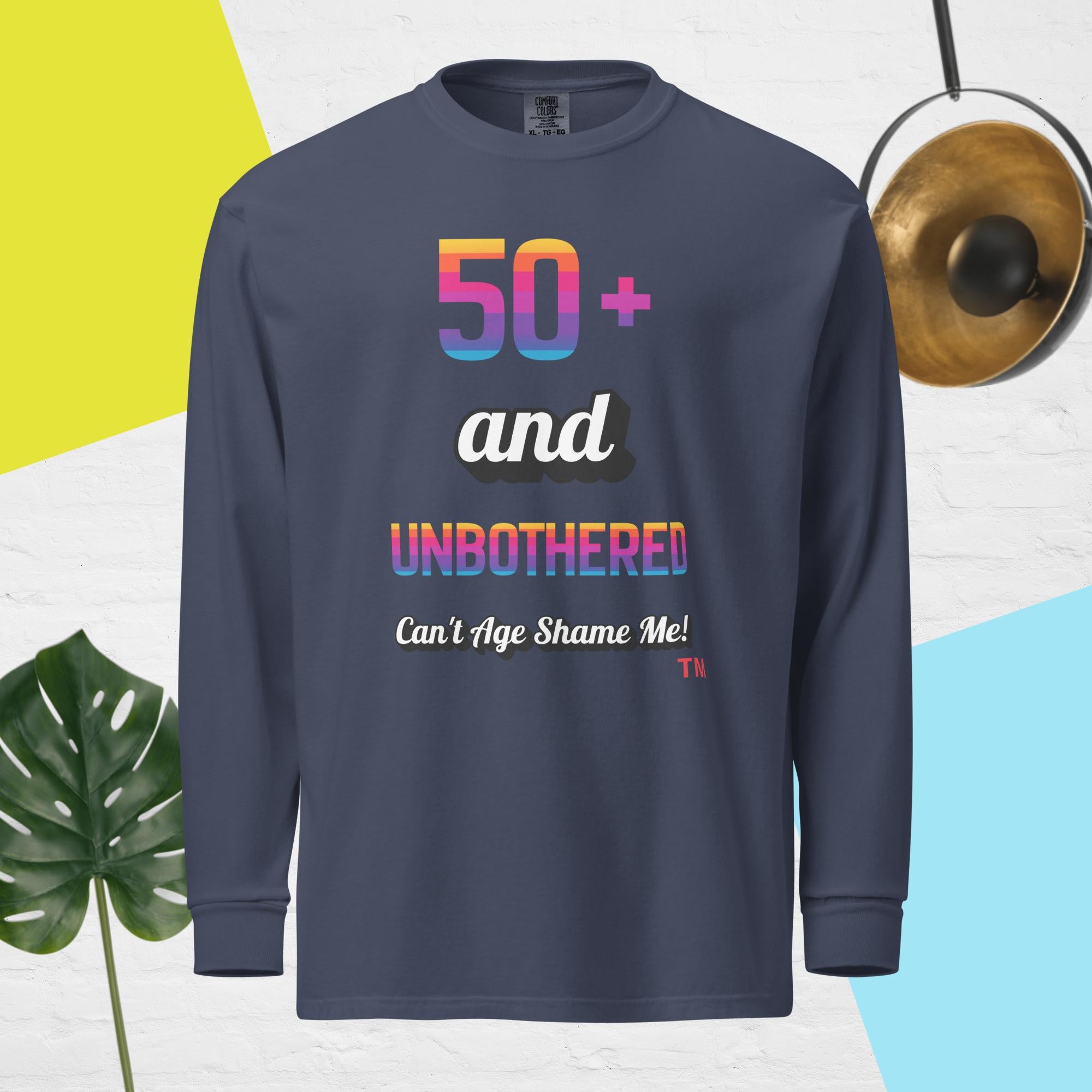 Navy blue long-sleeve shirt with colorful text design on a multicolored background