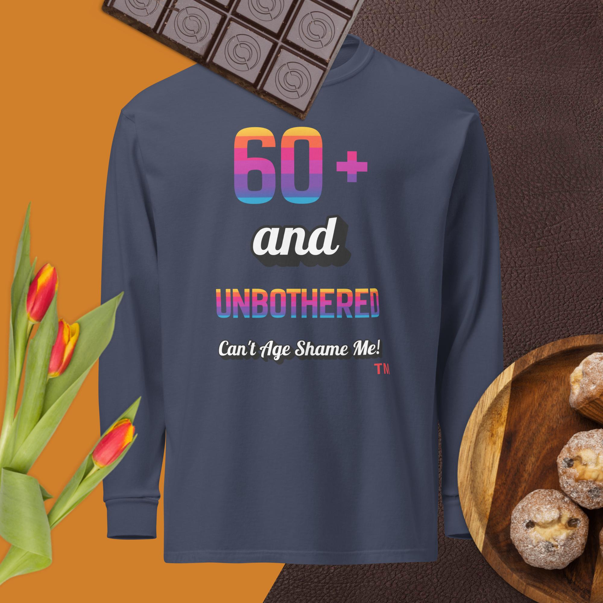 Navy blue sweatshirt with colorful text on a brown background with chocolate, tulips, and cookies.