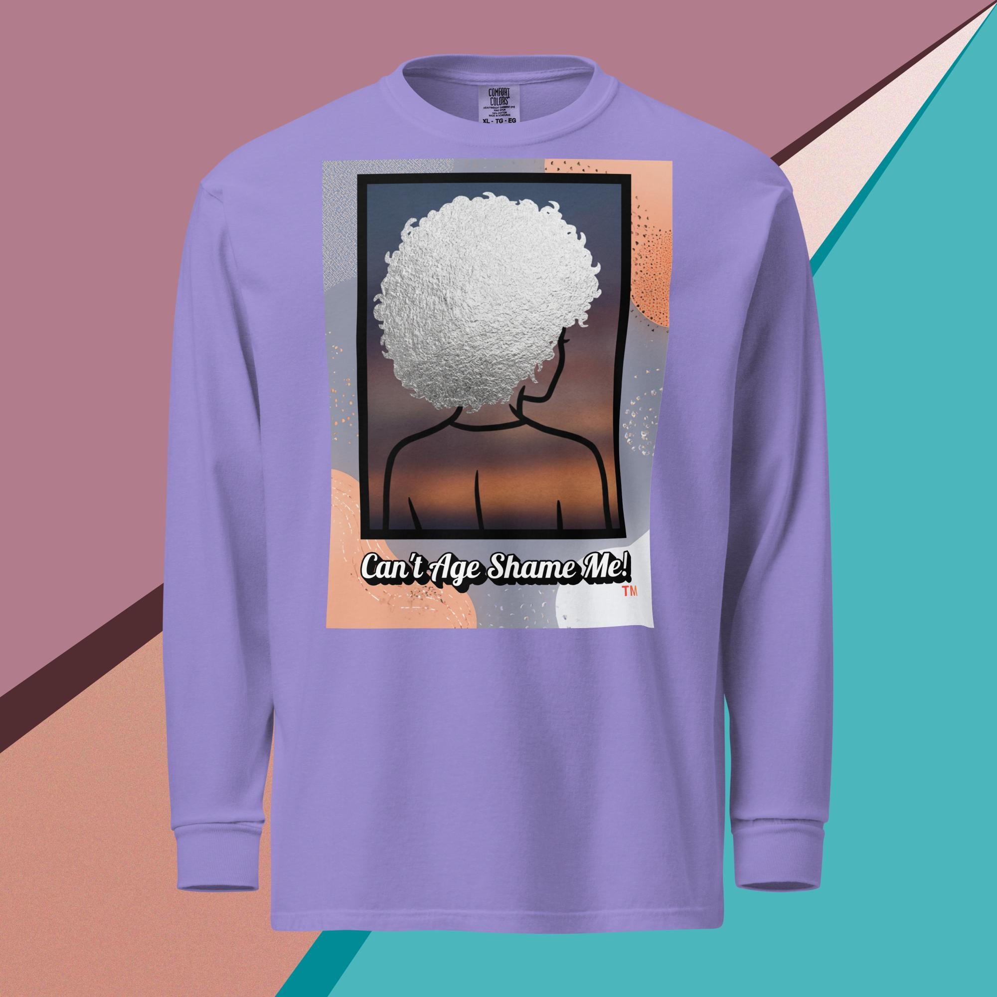 Violet long-sleeve shirt with a graphic design of a person with textured hair and text 'Can't Age Shame Me!' on a colorful background.