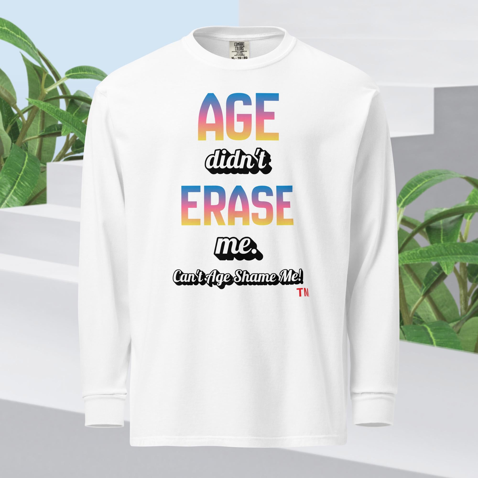 White long-sleeve shirt with colorful text design on a light blue background