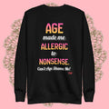 Black sweatshirt with colorful text on a pink background