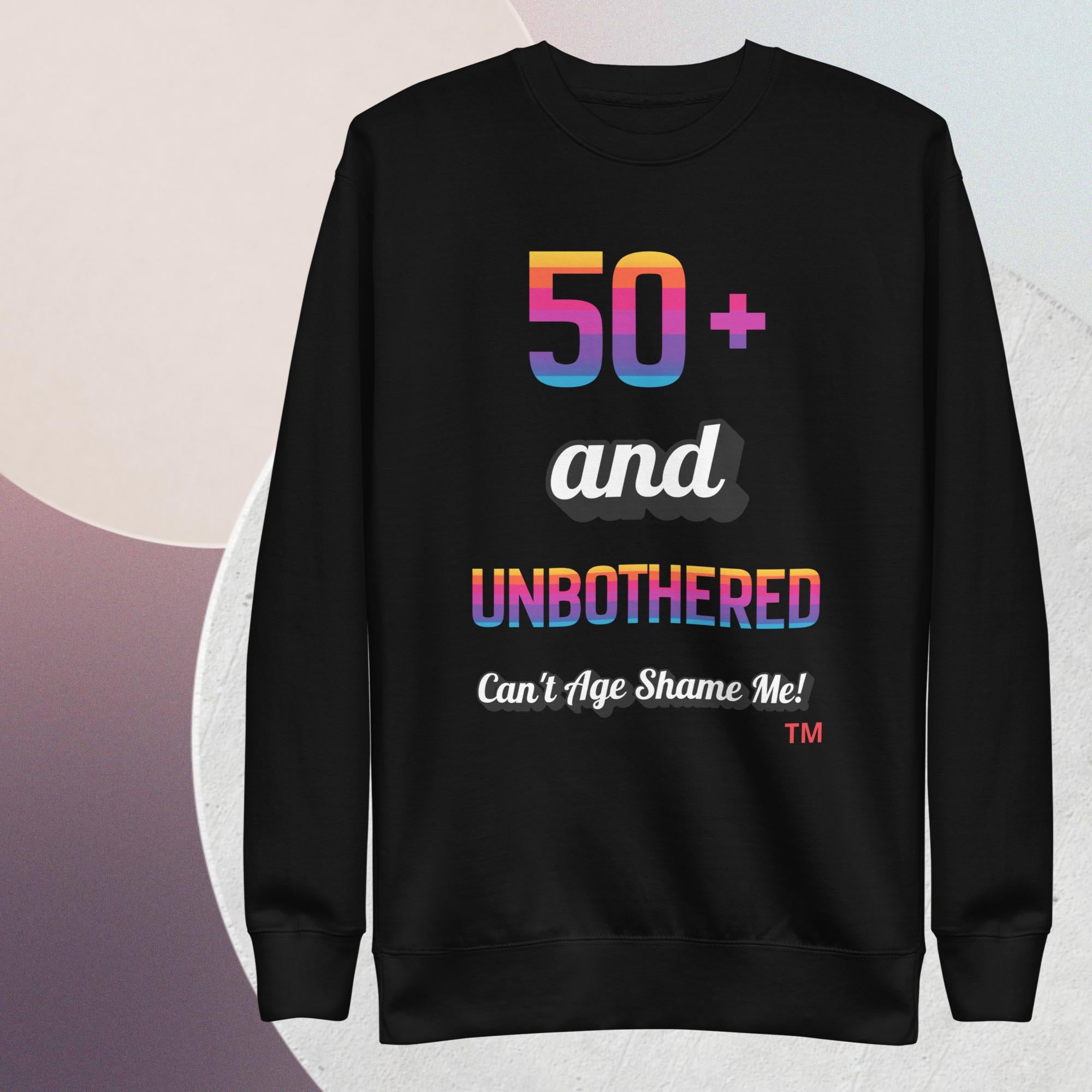 Black sweatshirt with colorful text on a gradient background