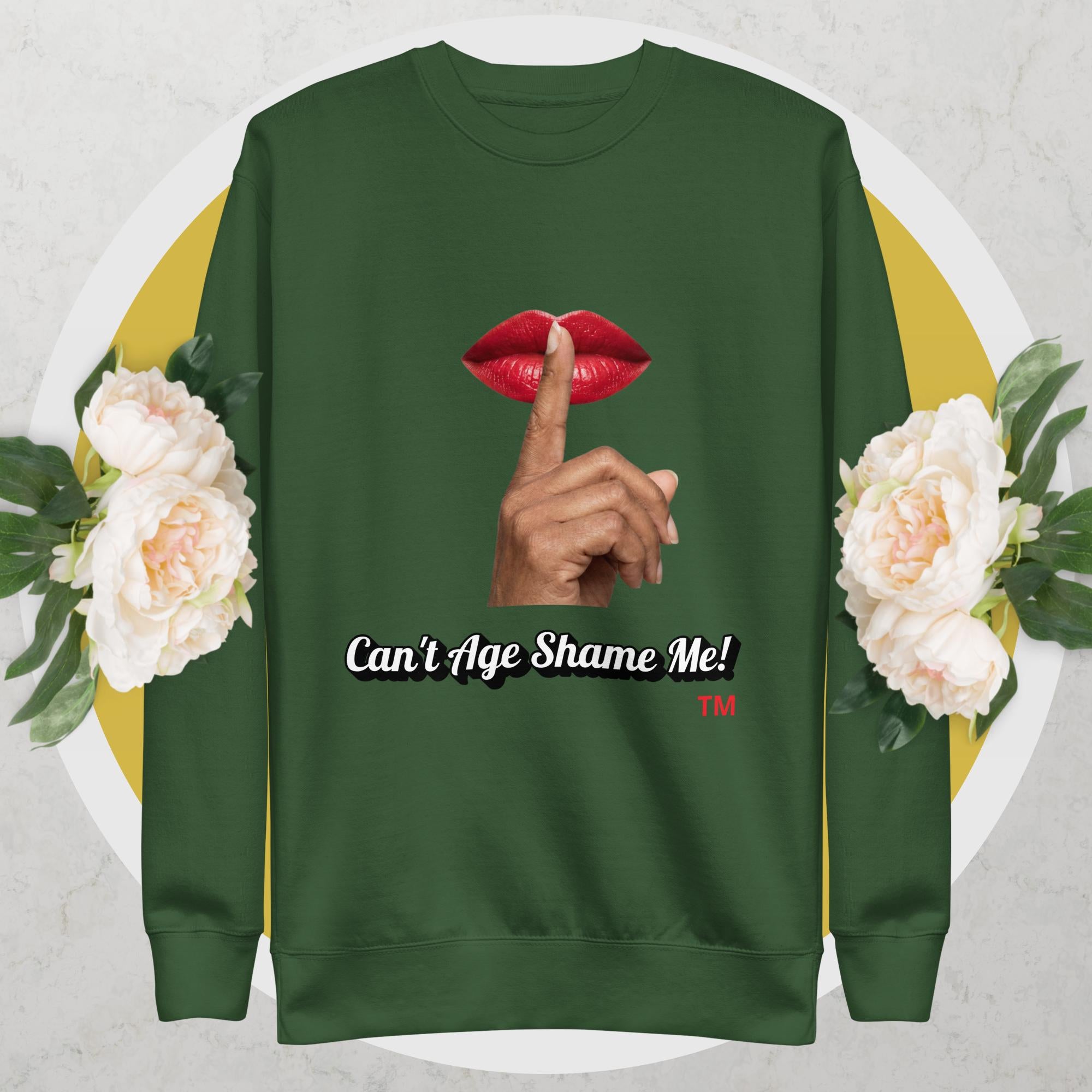 Forest Green sweatshirt with graphic design of a hand, lips, and text 'Can't Age Shame Me!' on a floral background.