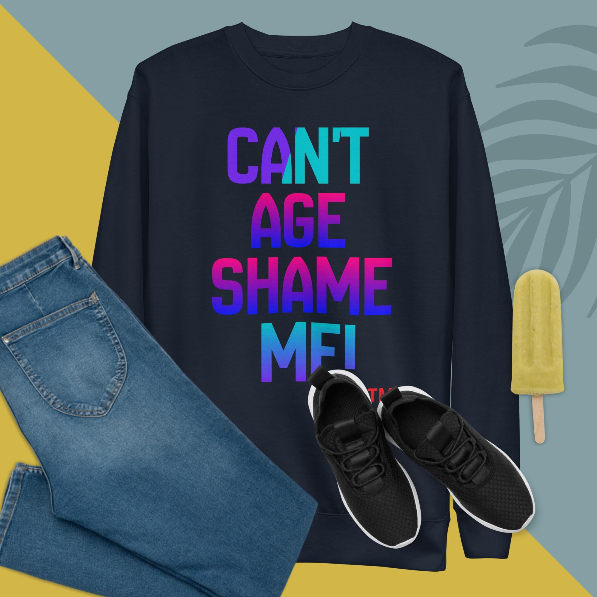 Black sweatshirt with colorful text, blue jeans, black sneakers, and a popsicle on a multicolored background
