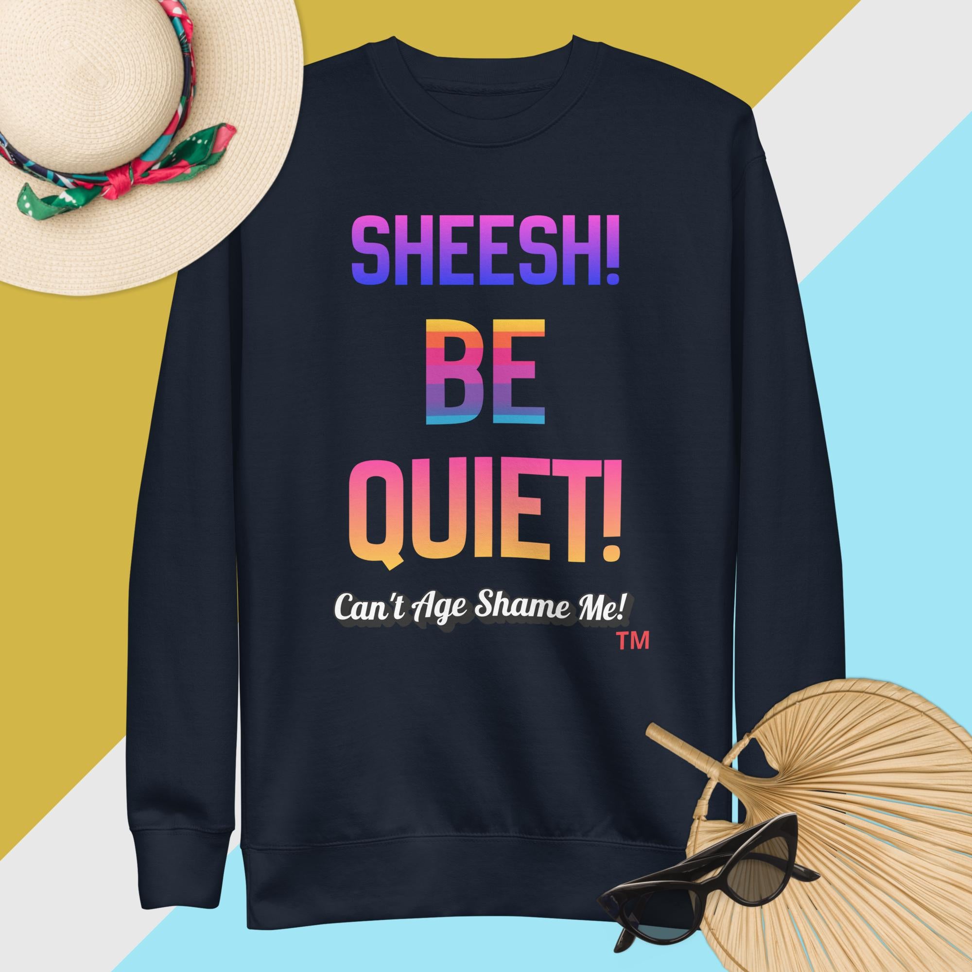 Navy sweatshirt with colorful text on a multicolored background