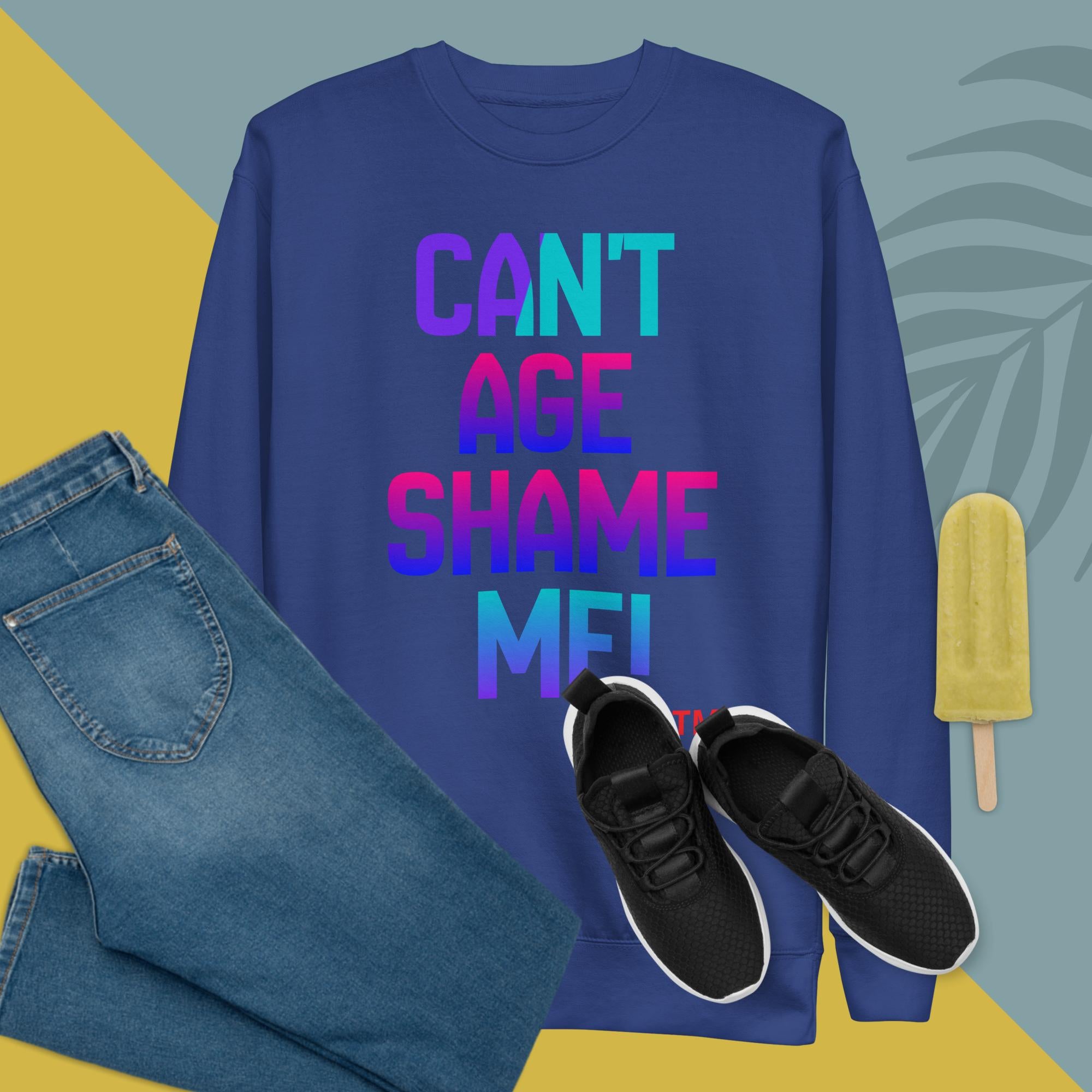 Blue sweatshirt with colorful text, jeans, black sneakers, and a popsicle on a multicolored background