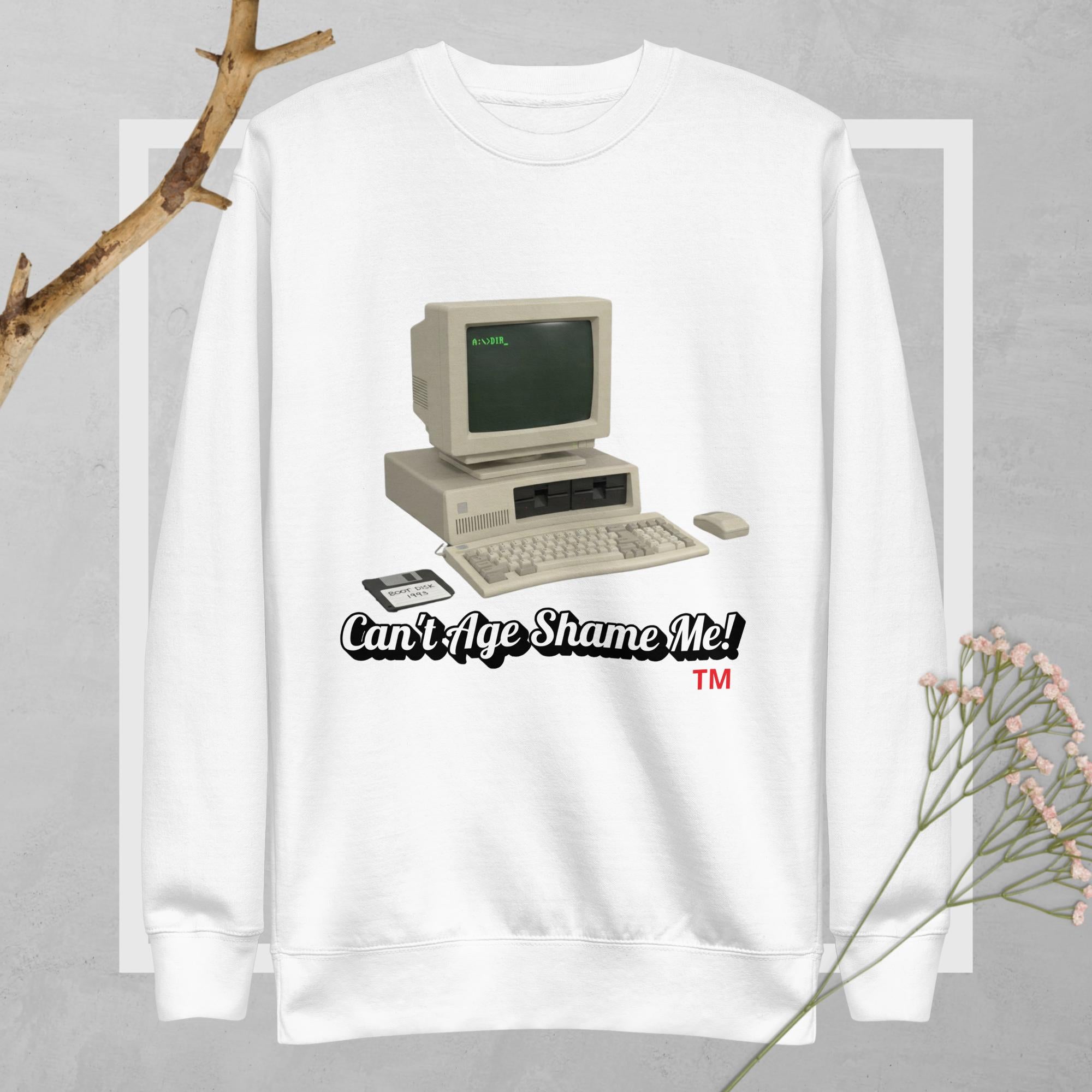 White sweatshirt with vintage computer graphic and text 'Can't Age Shame Me!'