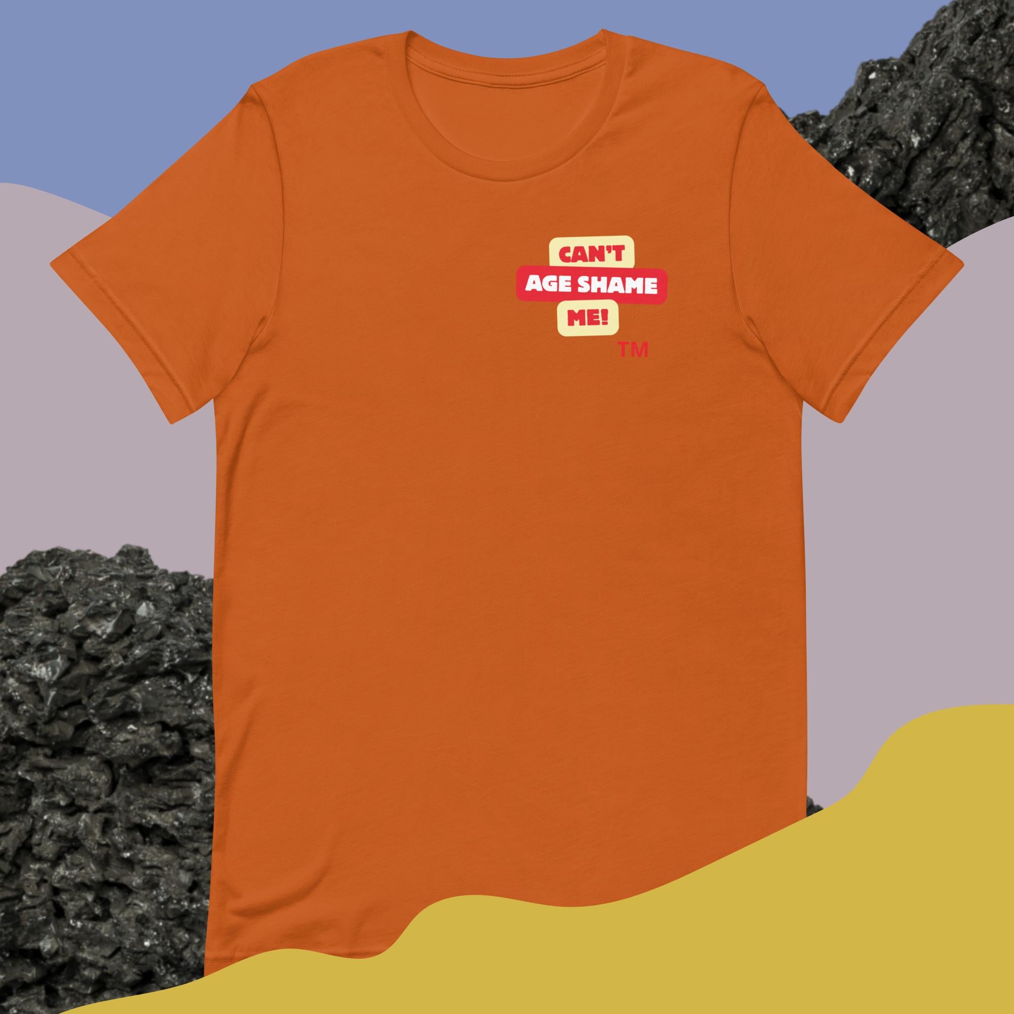 Autumn  t-shirt with a logo text graphic 'CAN'T AGE SHAME ME! design on a colorful abstract background