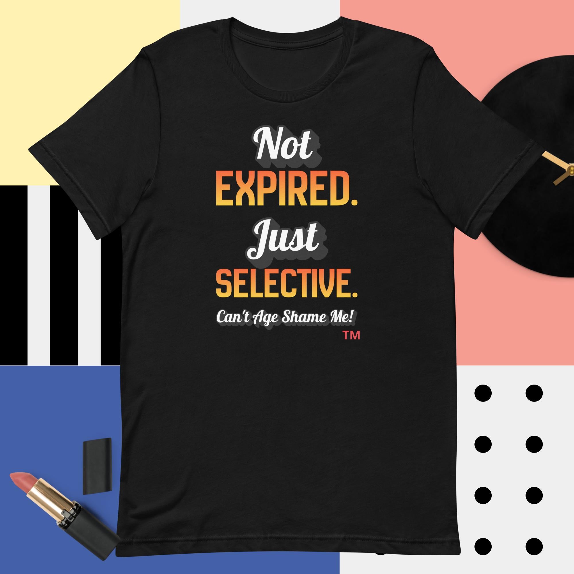 Black t-shirt with colorful text on a multicolored background