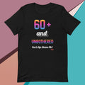 Black t-shirt with colorful text design on a multicolored background