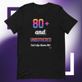 Black t-shirt with colorful text design on a purple background